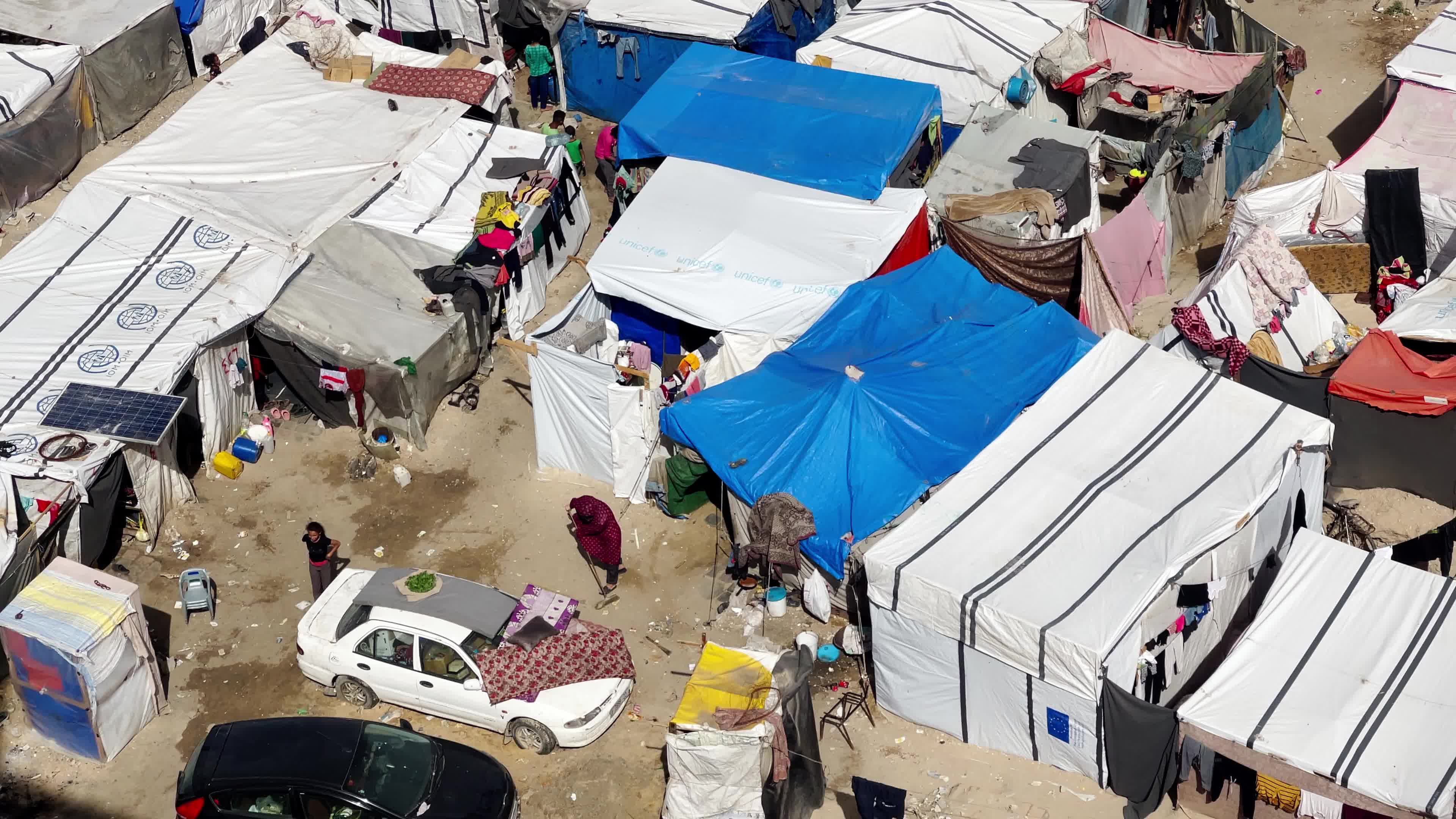 Internally Displaced Palestinians Shelter at Deir el-Balah Shore Amid Ongoing Gaza Conflict"