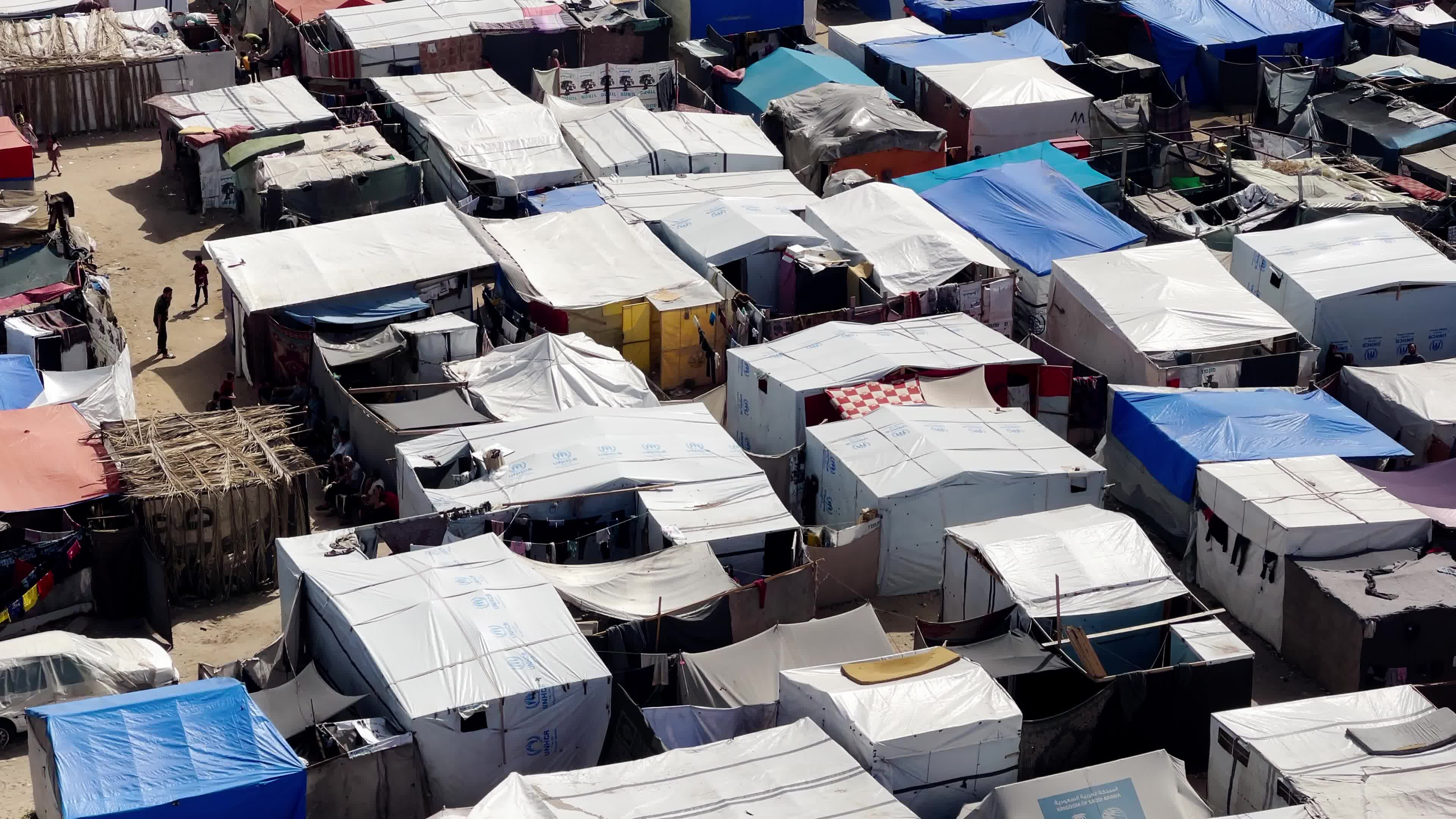 Internally Displaced Palestinians Shelter at Deir el-Balah Shore Amid Ongoing Gaza Conflict"