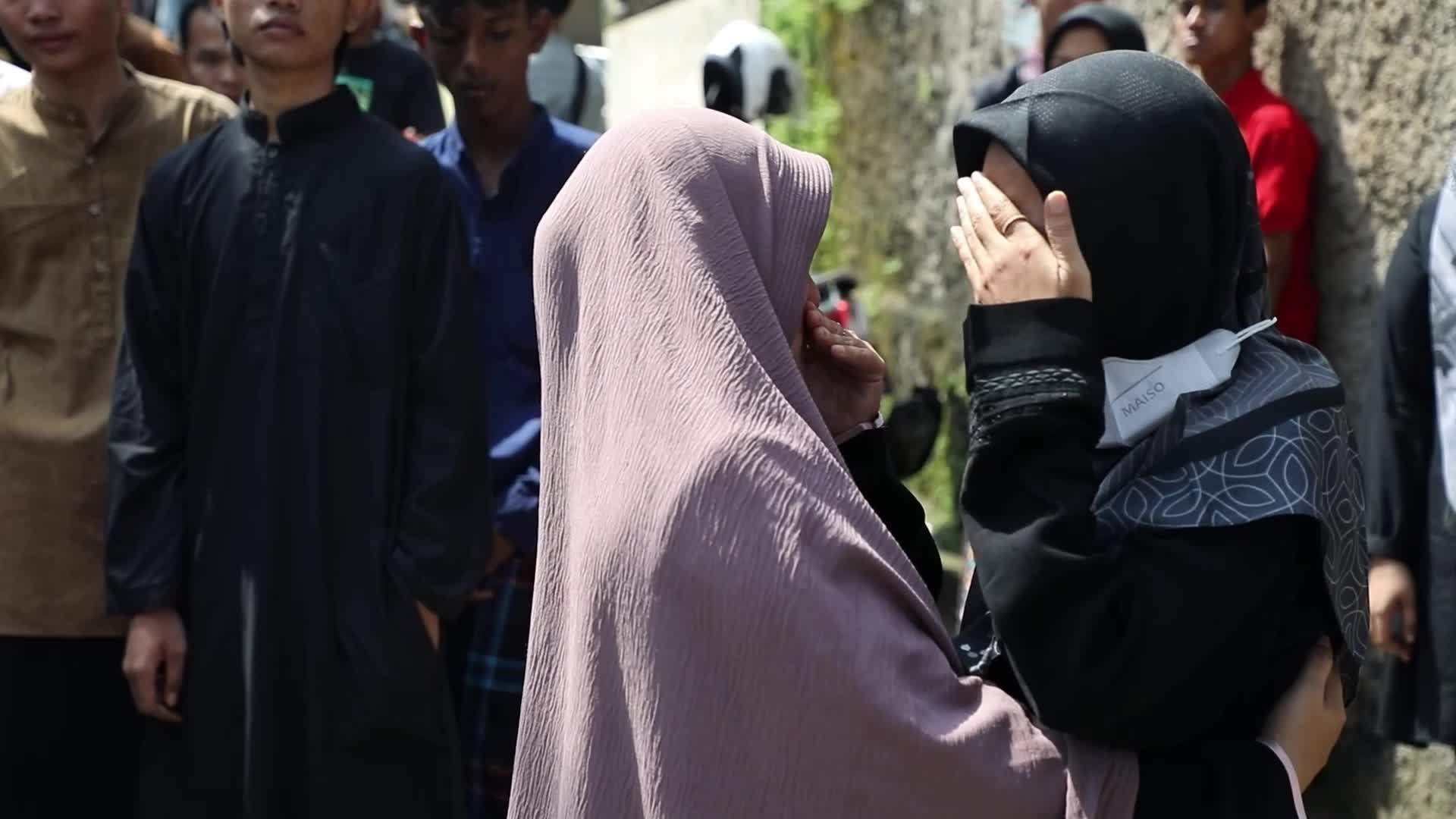 Burrial of Deadly Bus Accident carrying Students in Indonesia