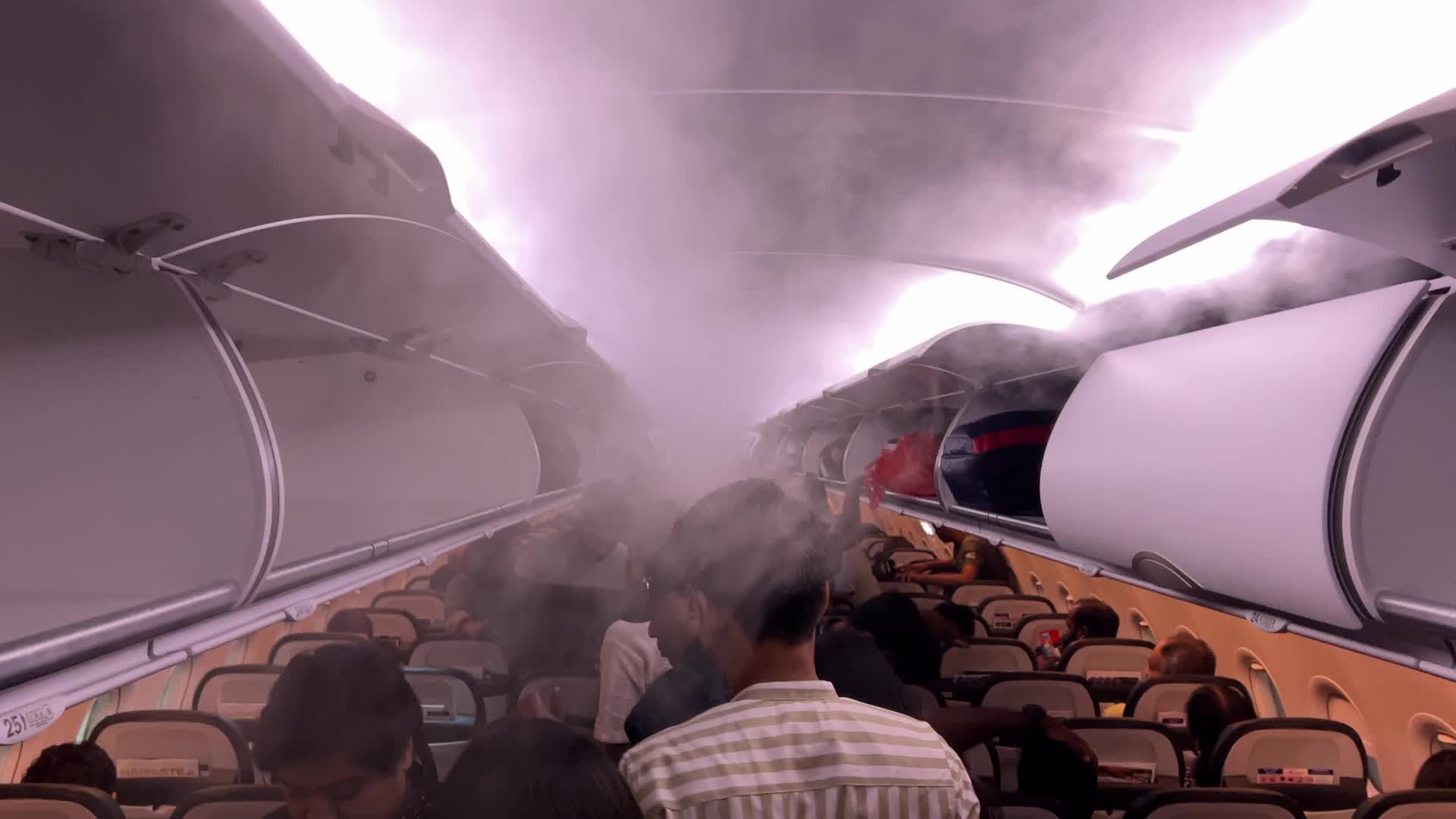 Passengers aboard an Air India airplane