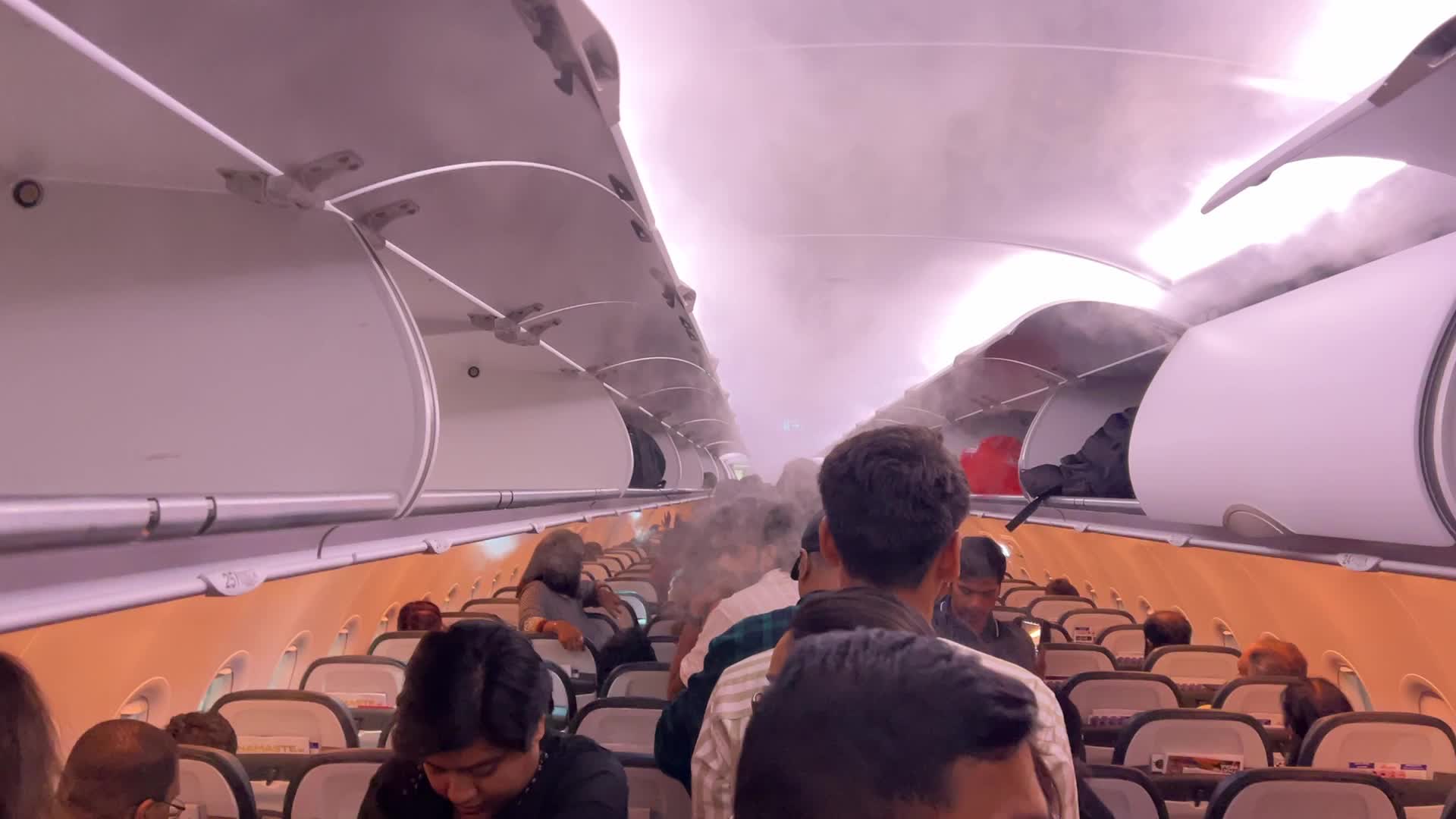 Passengers aboard an Air India airplane