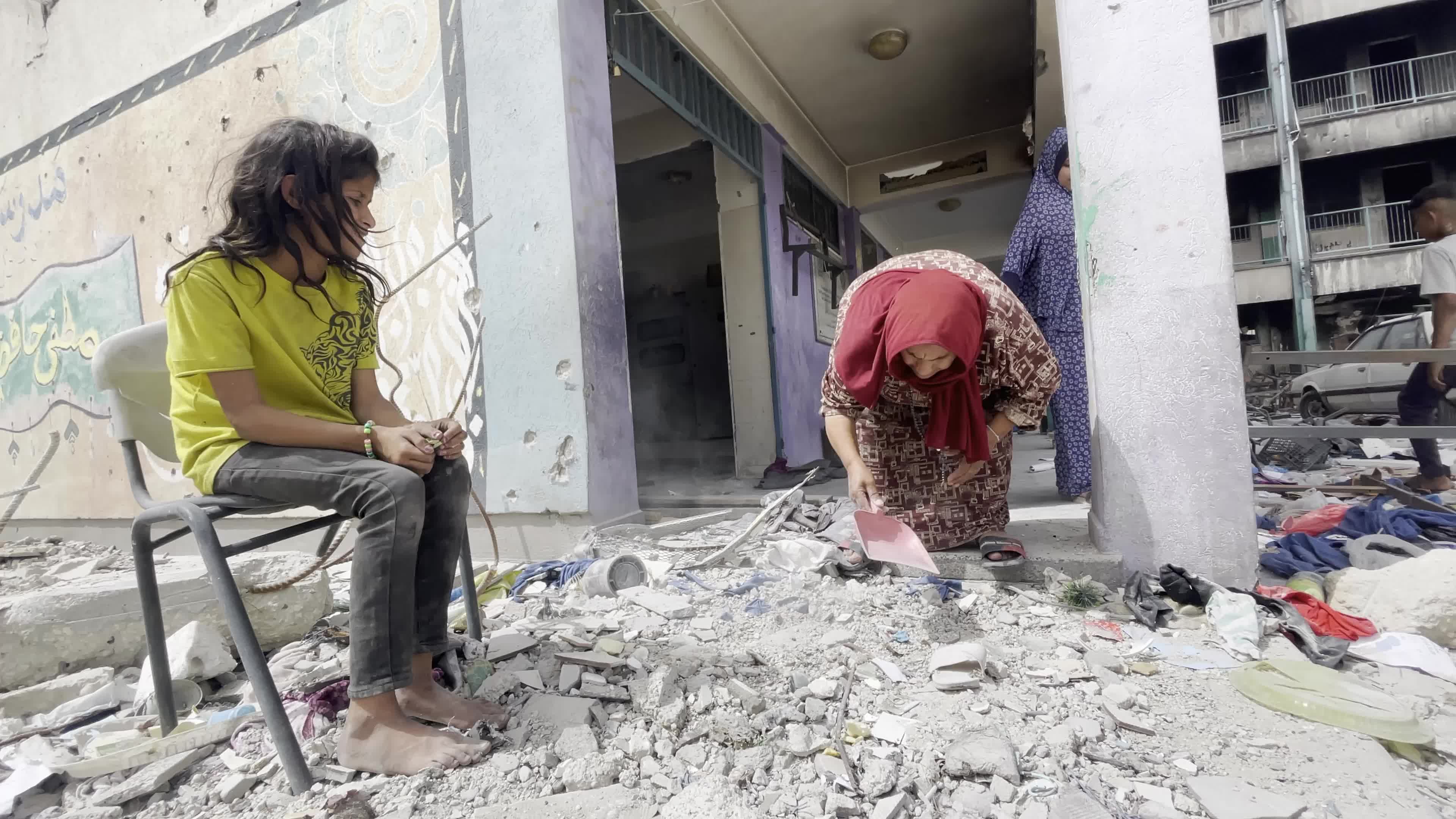 Displaced Palestinians Seek Refuge in Khan Yunis School Amid Hamas-Israel Conflict