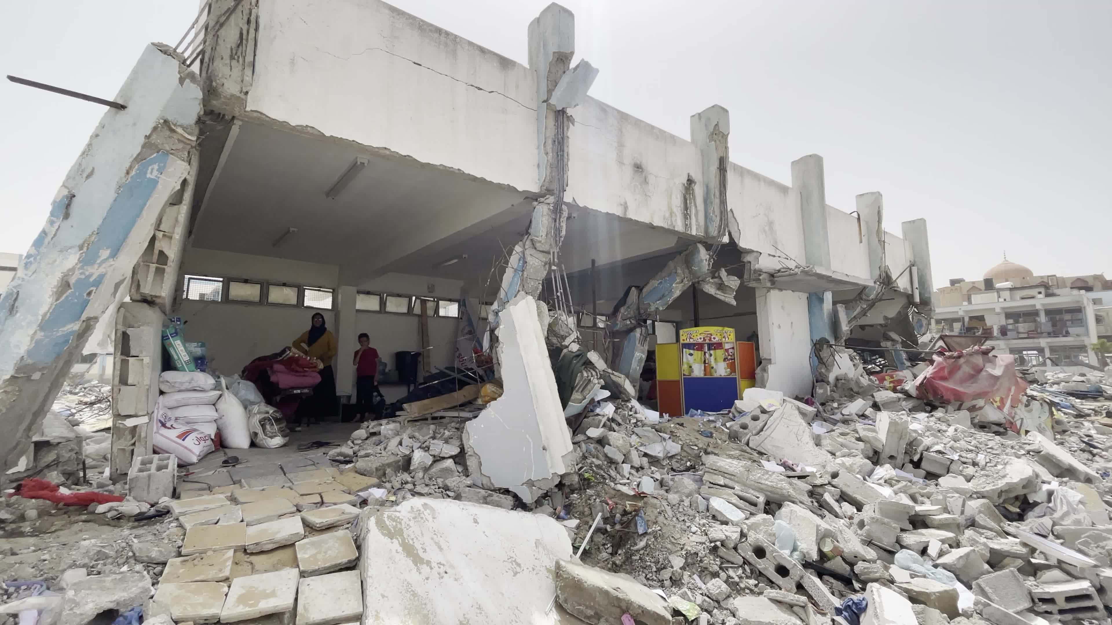 Displaced Palestinians Seek Refuge in Khan Yunis School Amid Hamas-Israel Conflict