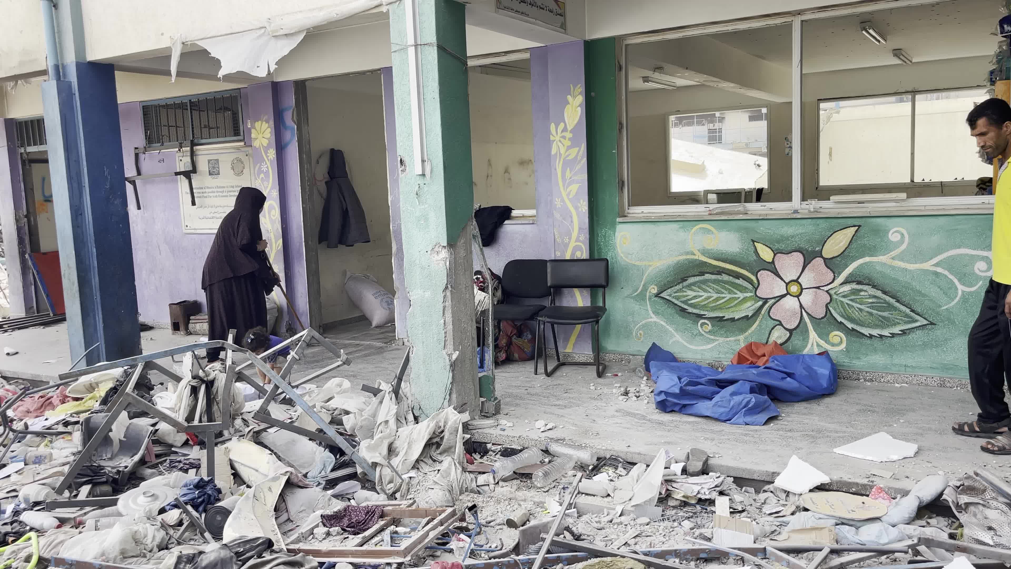 Displaced Palestinians Seek Refuge in Khan Yunis School Amid Hamas-Israel Conflict