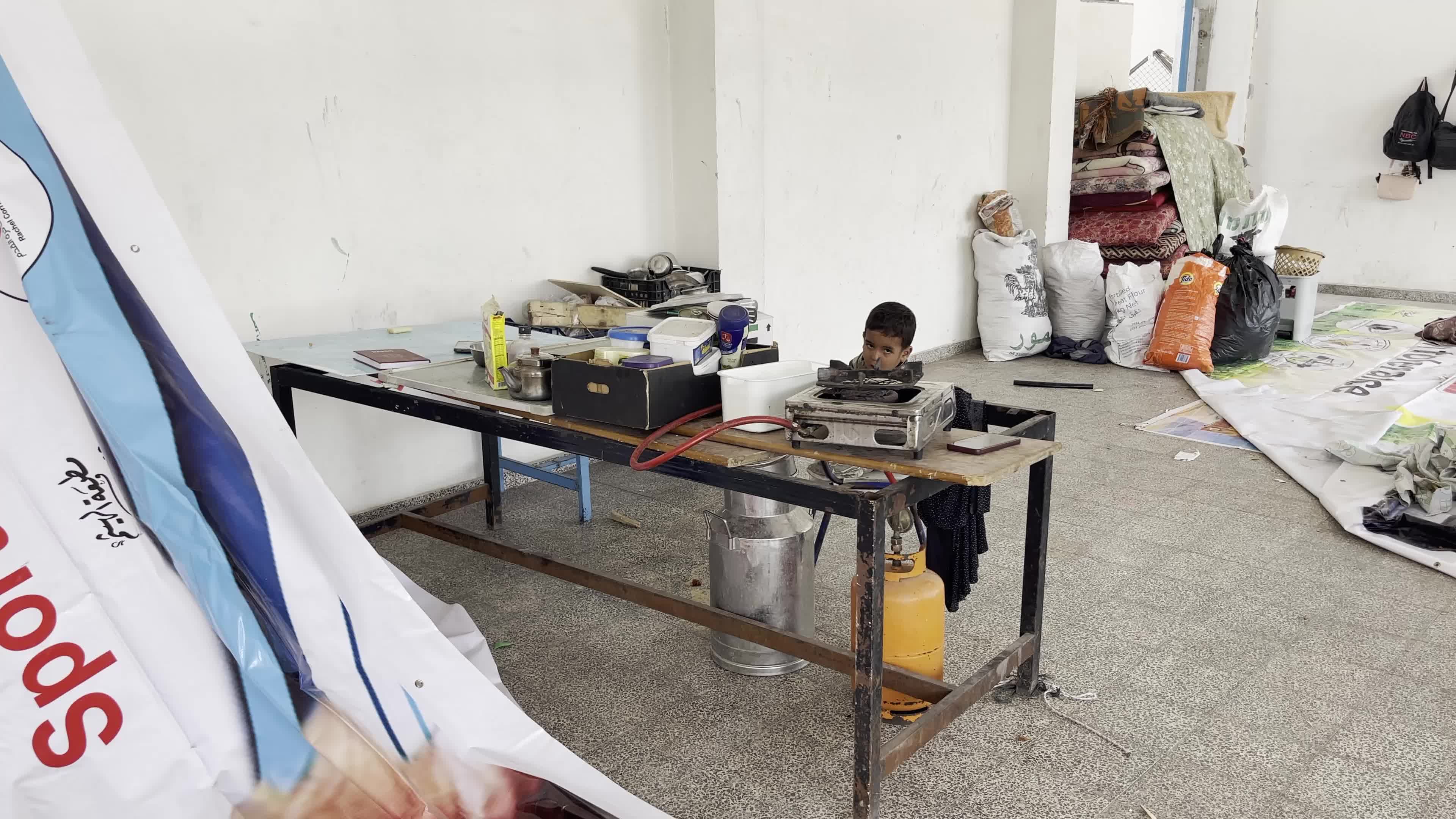 Displaced Palestinians Seek Refuge in Khan Yunis School Amid Hamas-Israel Conflict