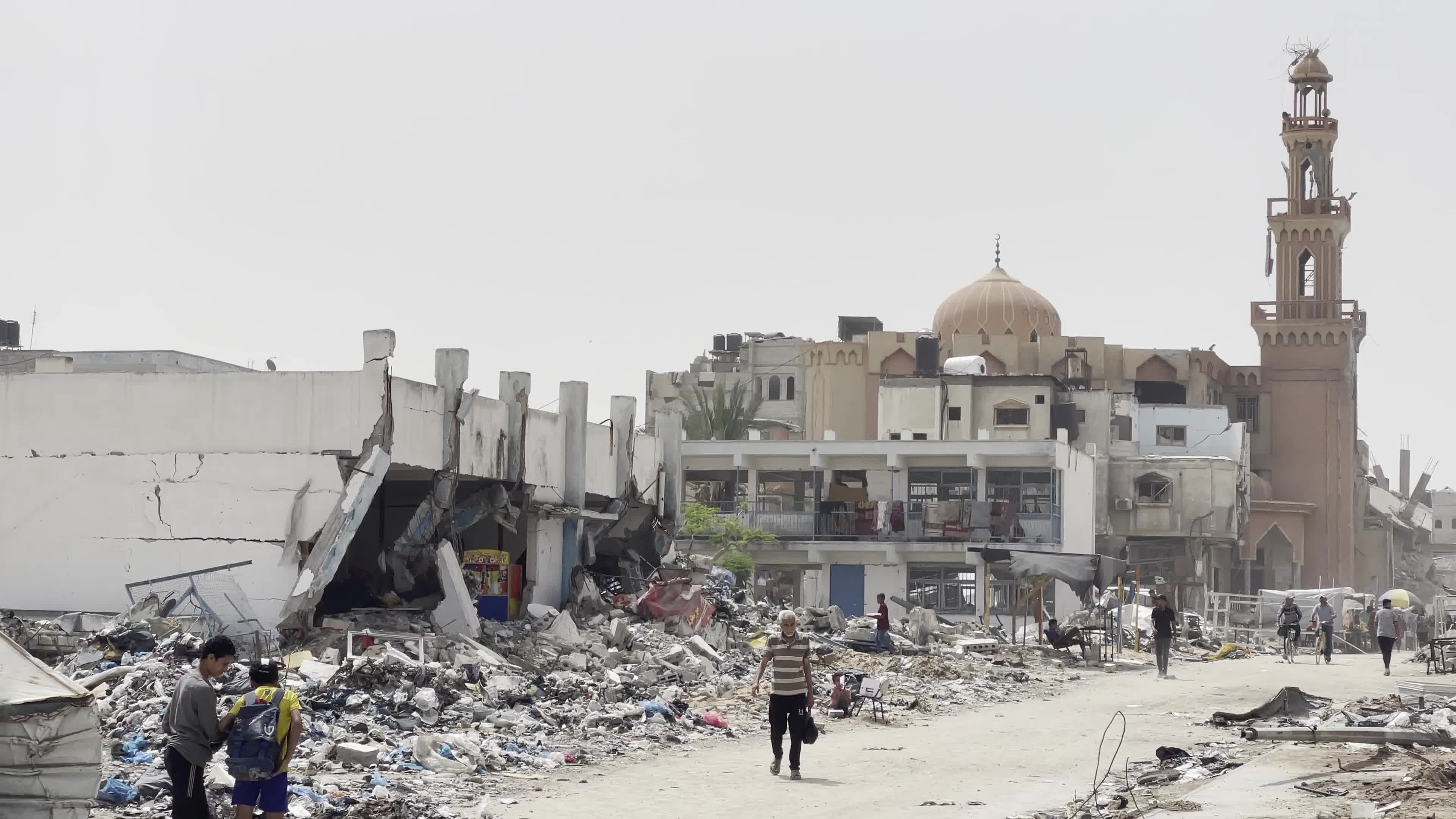 Displaced Palestinians Seek Refuge in Khan Yunis School Amid Hamas-Israel Conflict