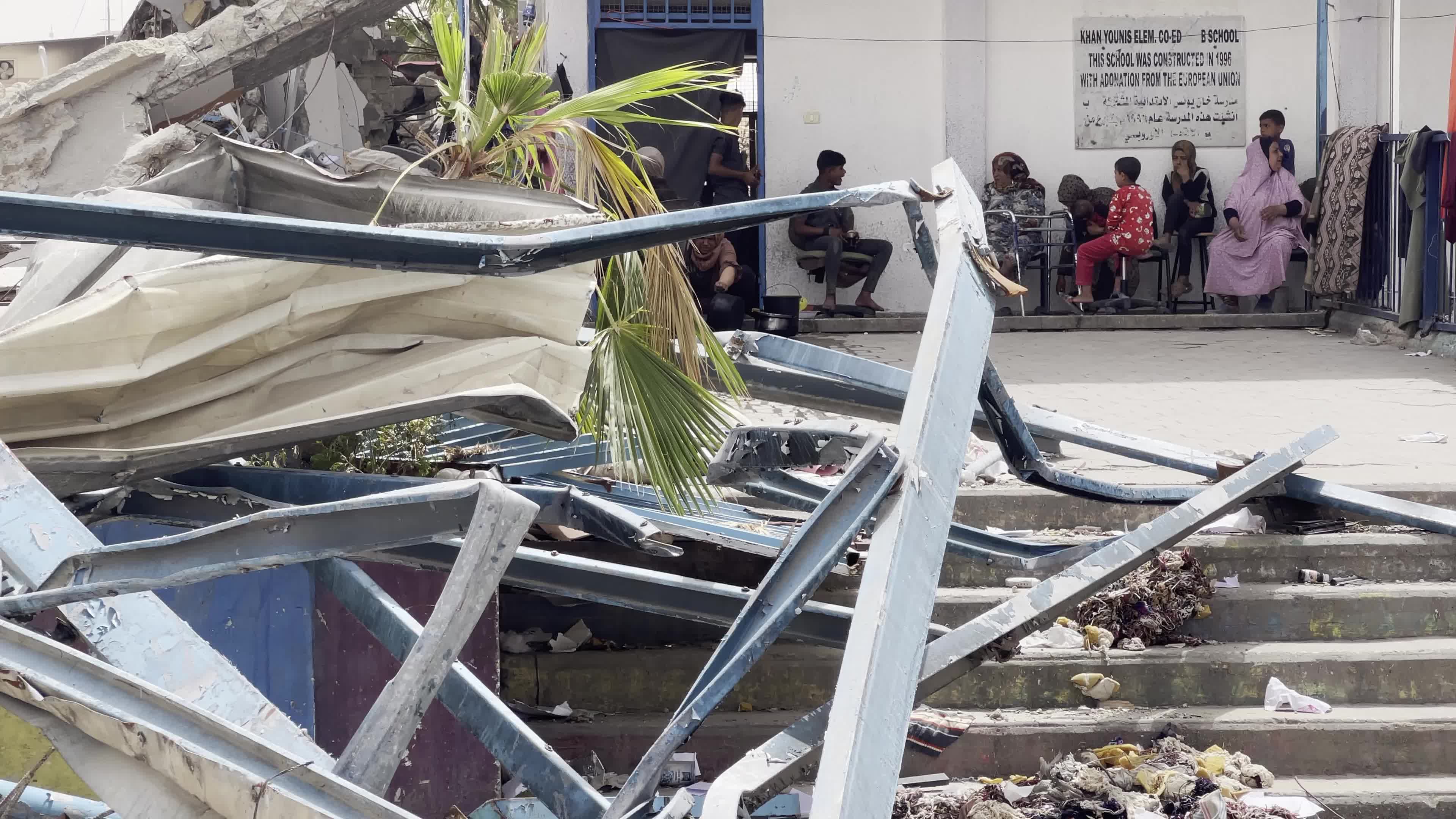 Displaced Palestinians Seek Refuge in Khan Yunis School Amid Hamas-Israel Conflict