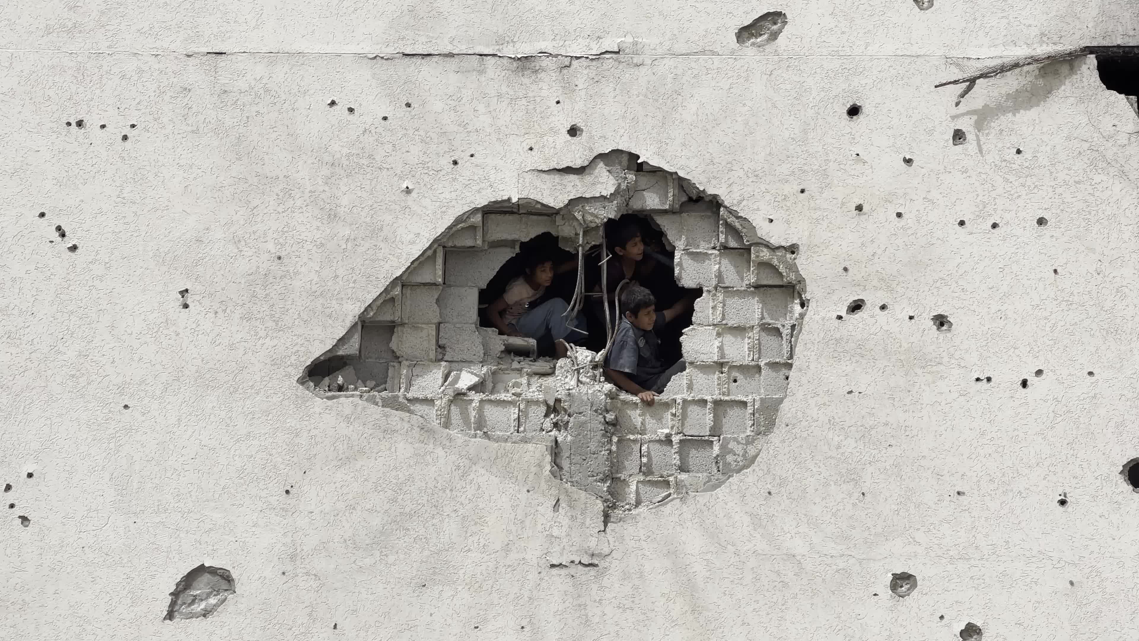 Displaced Palestinians Seek Refuge in Khan Yunis School Amid Hamas-Israel Conflict