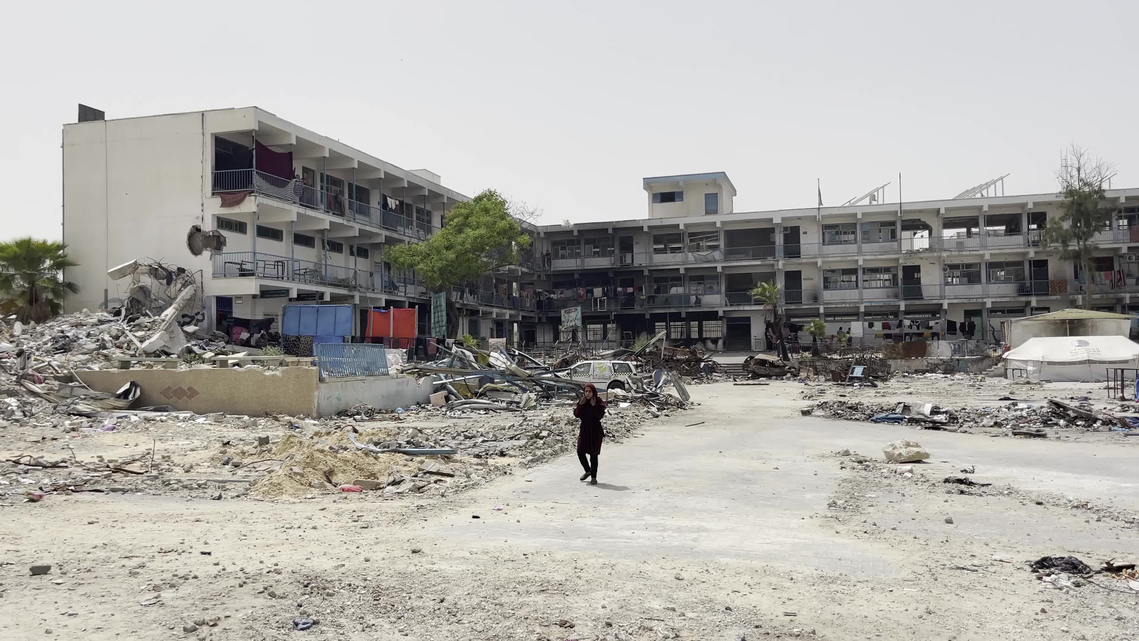 Displaced Palestinians Seek Refuge in Khan Yunis School Amid Hamas-Israel Conflict