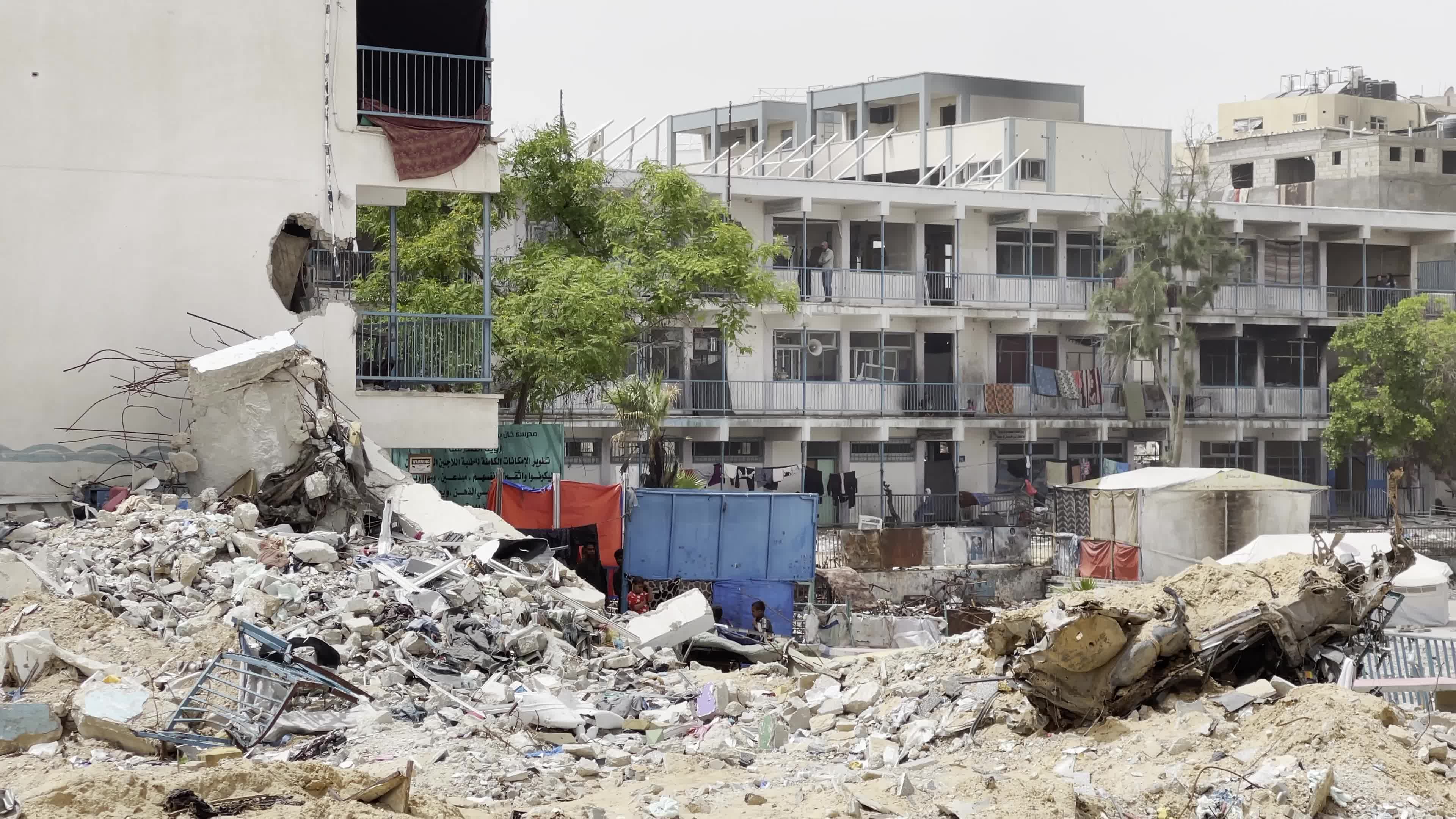 Displaced Palestinians Seek Refuge in Khan Yunis School Amid Hamas-Israel Conflict