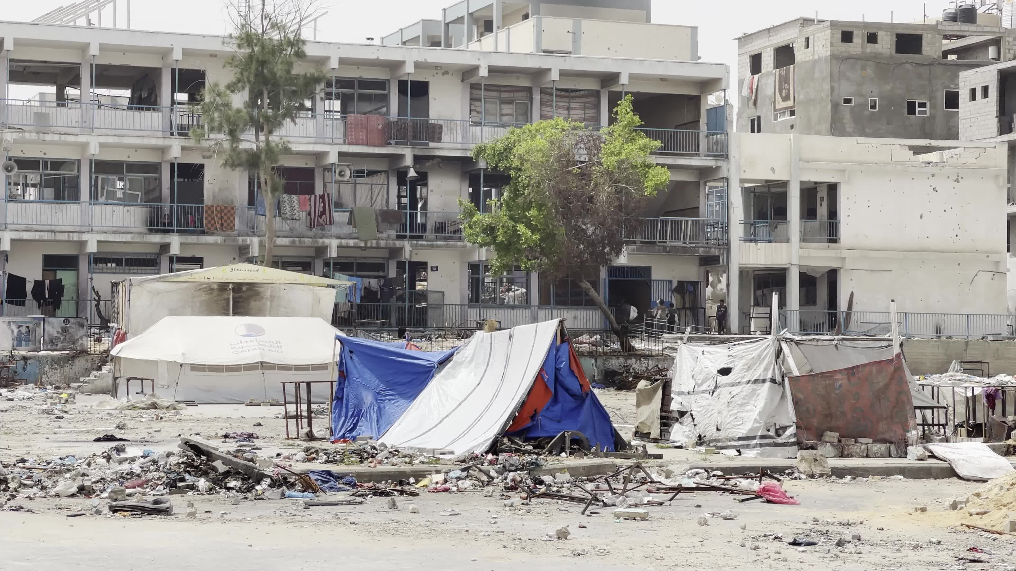 Displaced Palestinians Seek Refuge in Khan Yunis School Amid Hamas-Israel Conflict