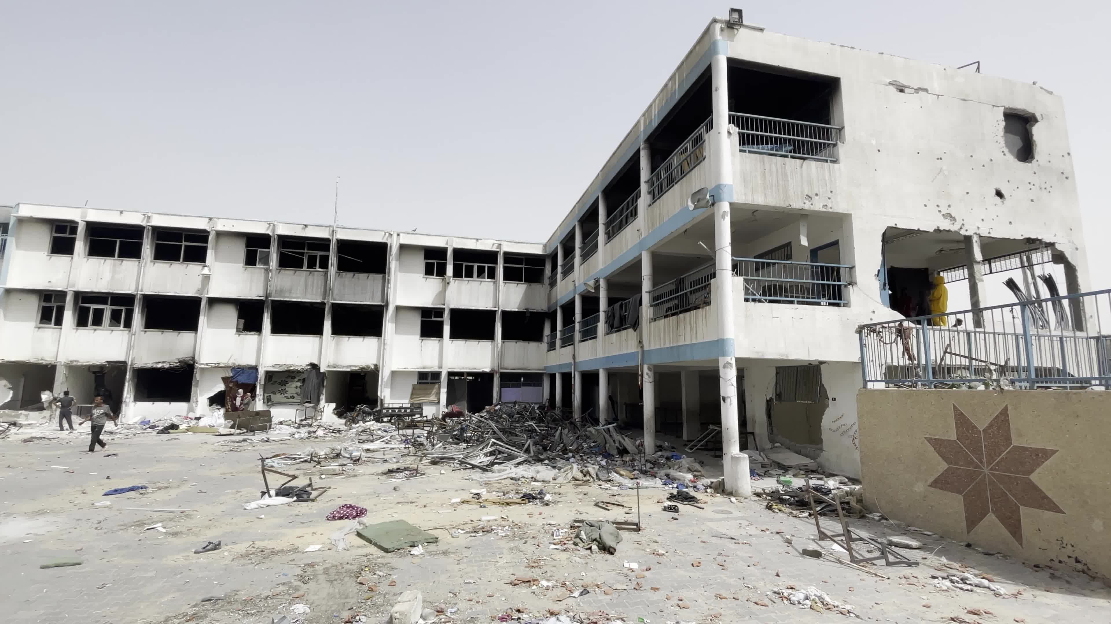 Displaced Palestinians Seek Refuge in Khan Yunis School Amid Hamas-Israel Conflict