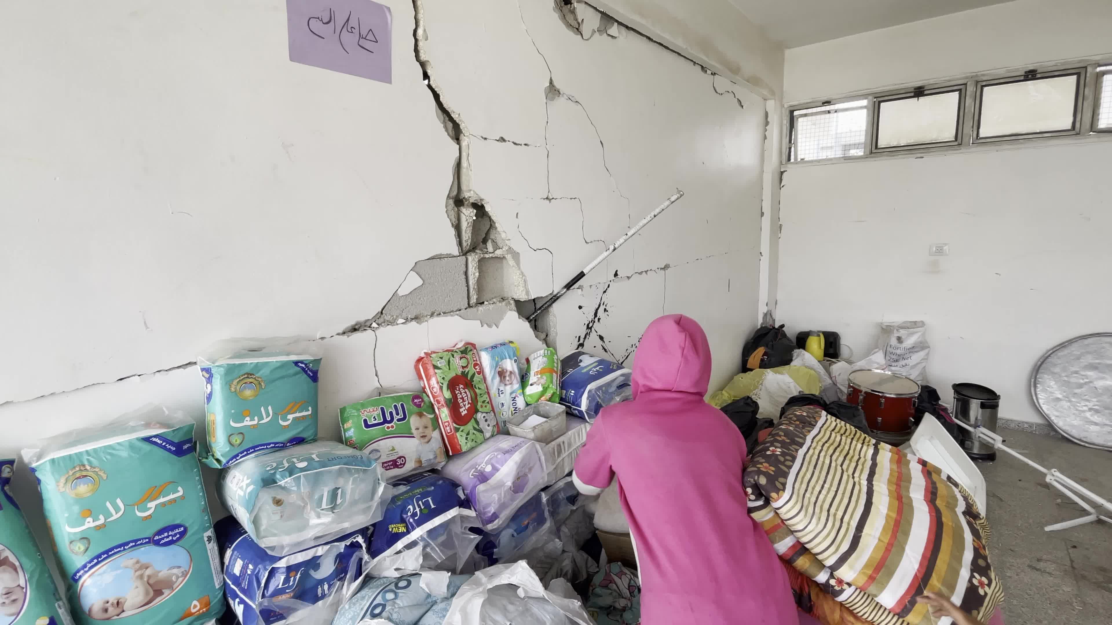 Displaced Palestinians Seek Refuge in Khan Yunis School Amid Hamas-Israel Conflict