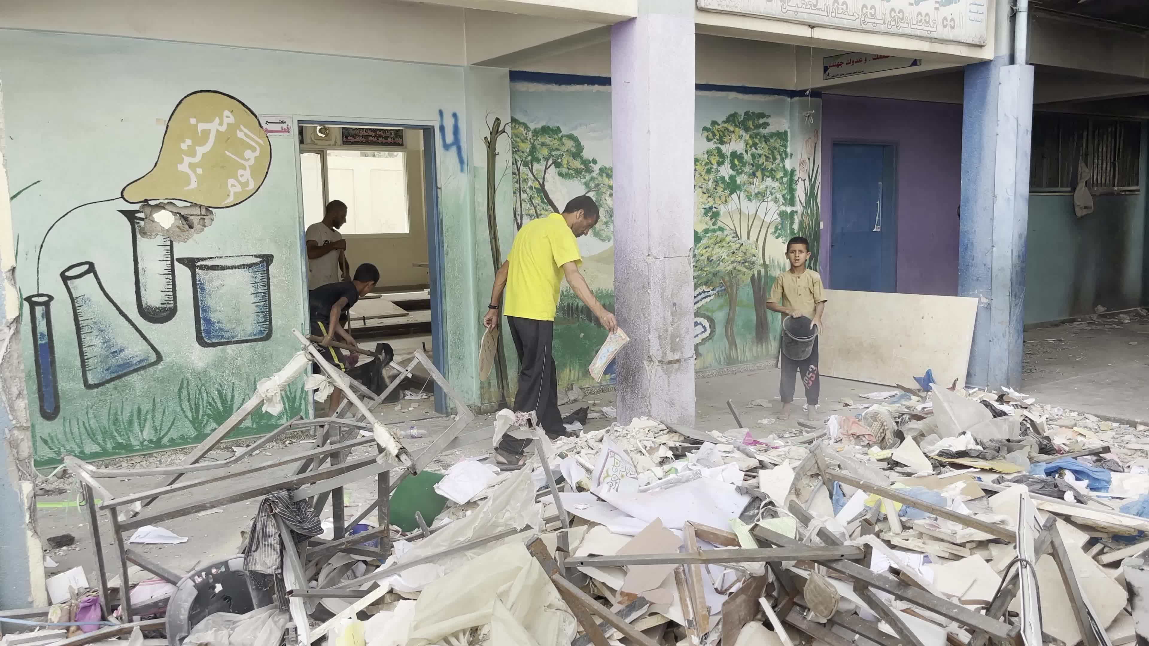 Displaced Palestinians Seek Refuge in Khan Yunis School Amid Hamas-Israel Conflict