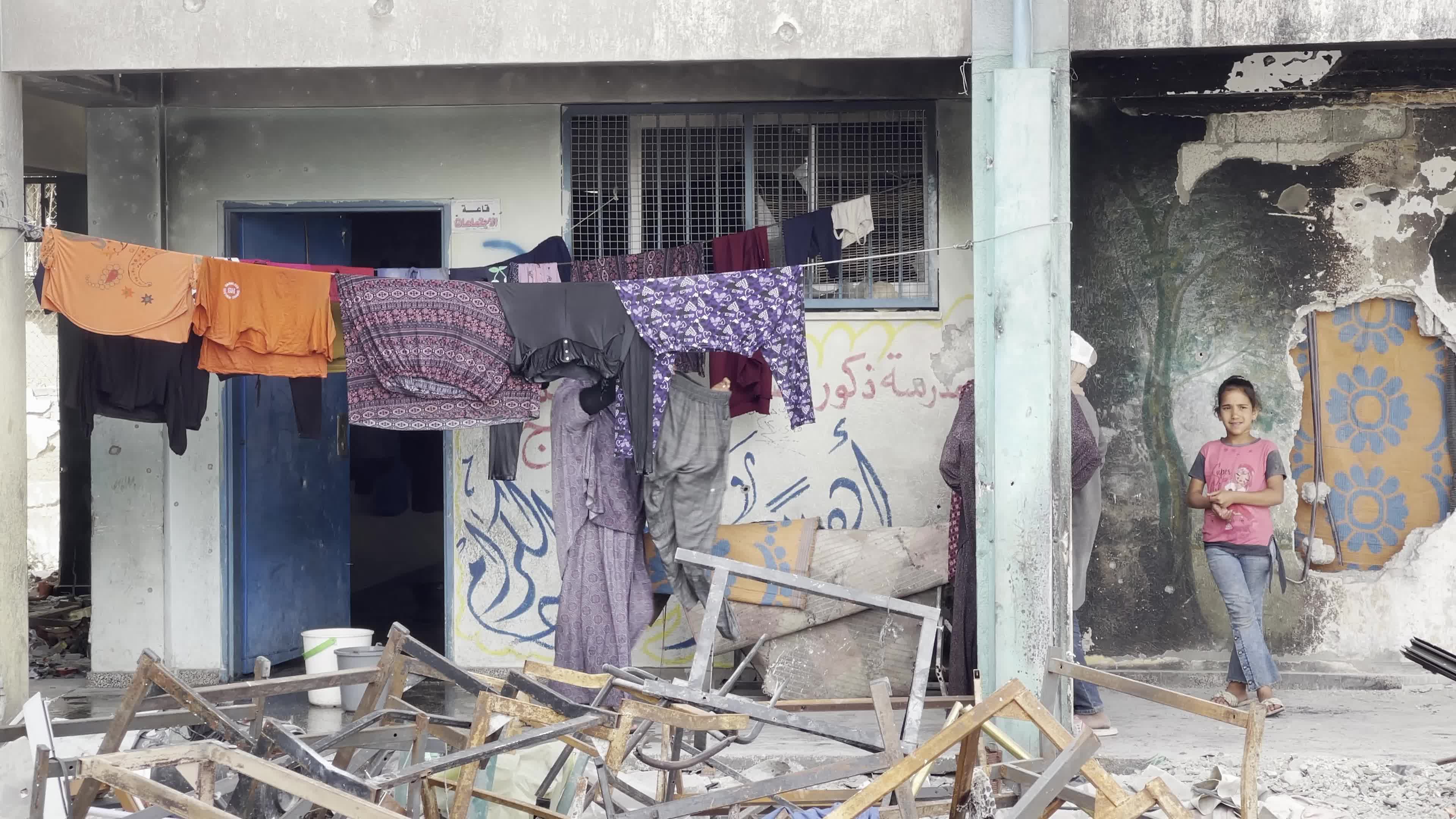 Displaced Palestinians Seek Refuge in Khan Yunis School Amid Hamas-Israel Conflict