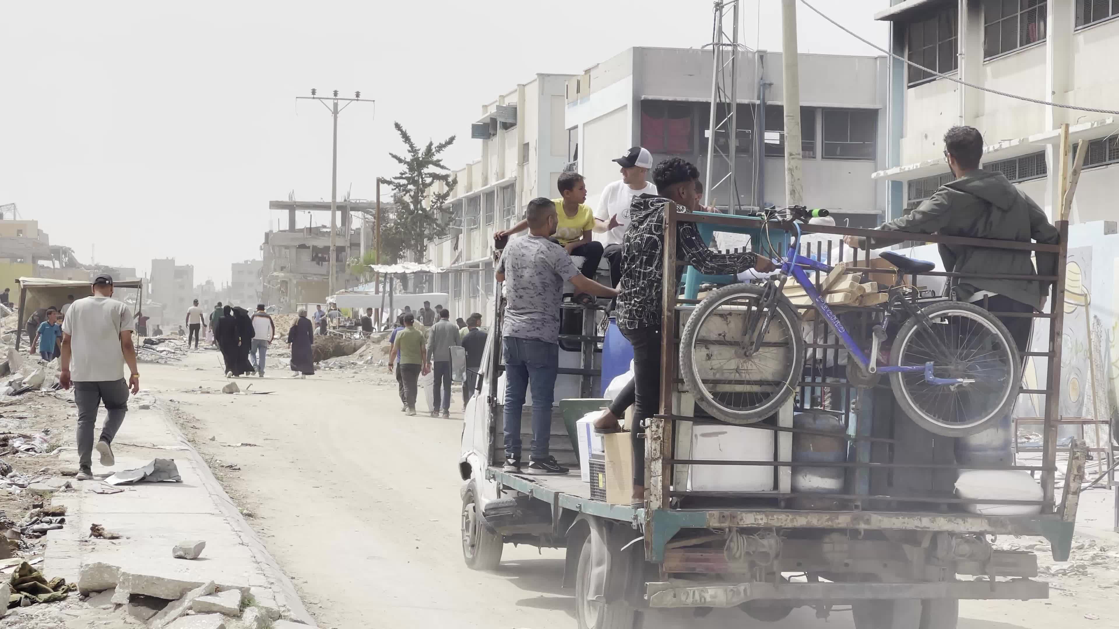 Displaced Palestinians Seek Refuge in Khan Yunis School Amid Hamas-Israel Conflict