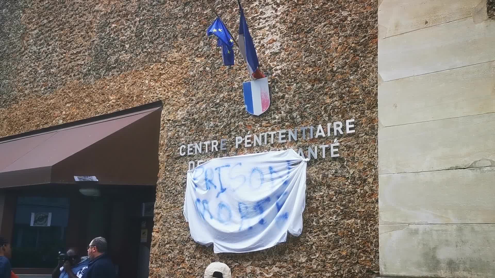 Prison officers block the Sante prison in Paris