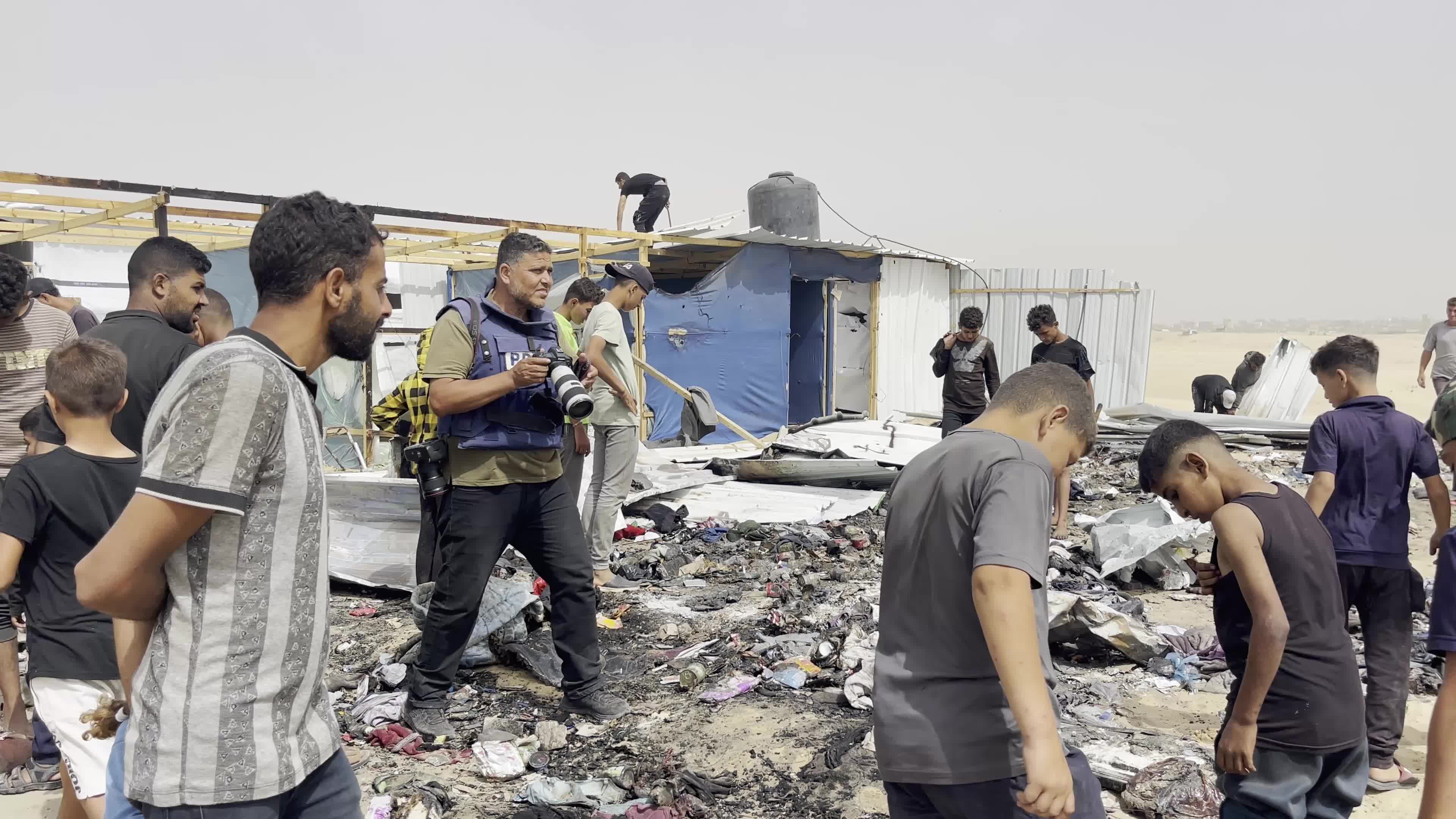 Palestinians Gather at Site of Israeli Strike on Camp for Internally Displaced in Rafah 