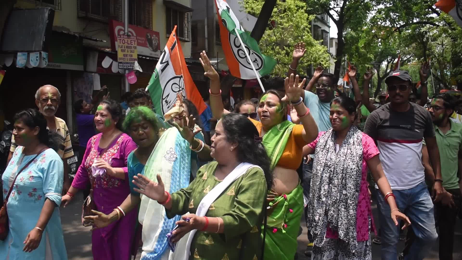Trinamool Congress party (TMC) members cheer during Lok Sabha Election Result In Kolkata, India