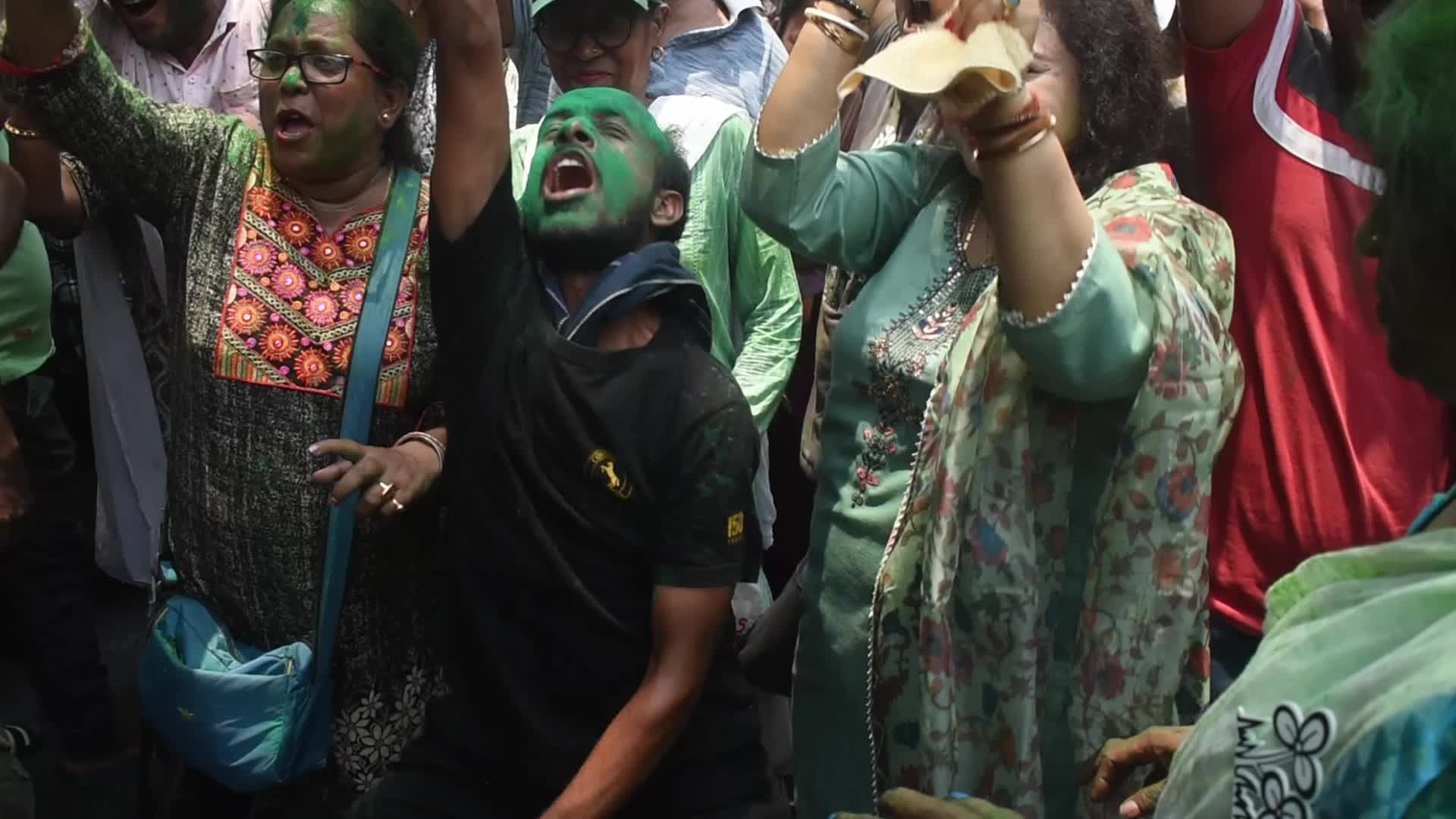 Trinamool Congress party (TMC) members cheer during Lok Sabha Election Result In Kolkata, India