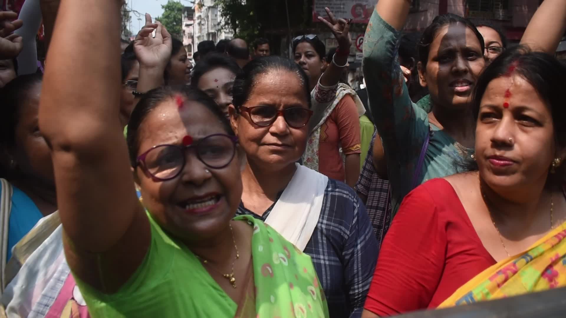 Trinamool Congress party (TMC) members cheer during Lok Sabha Election Result In Kolkata, India