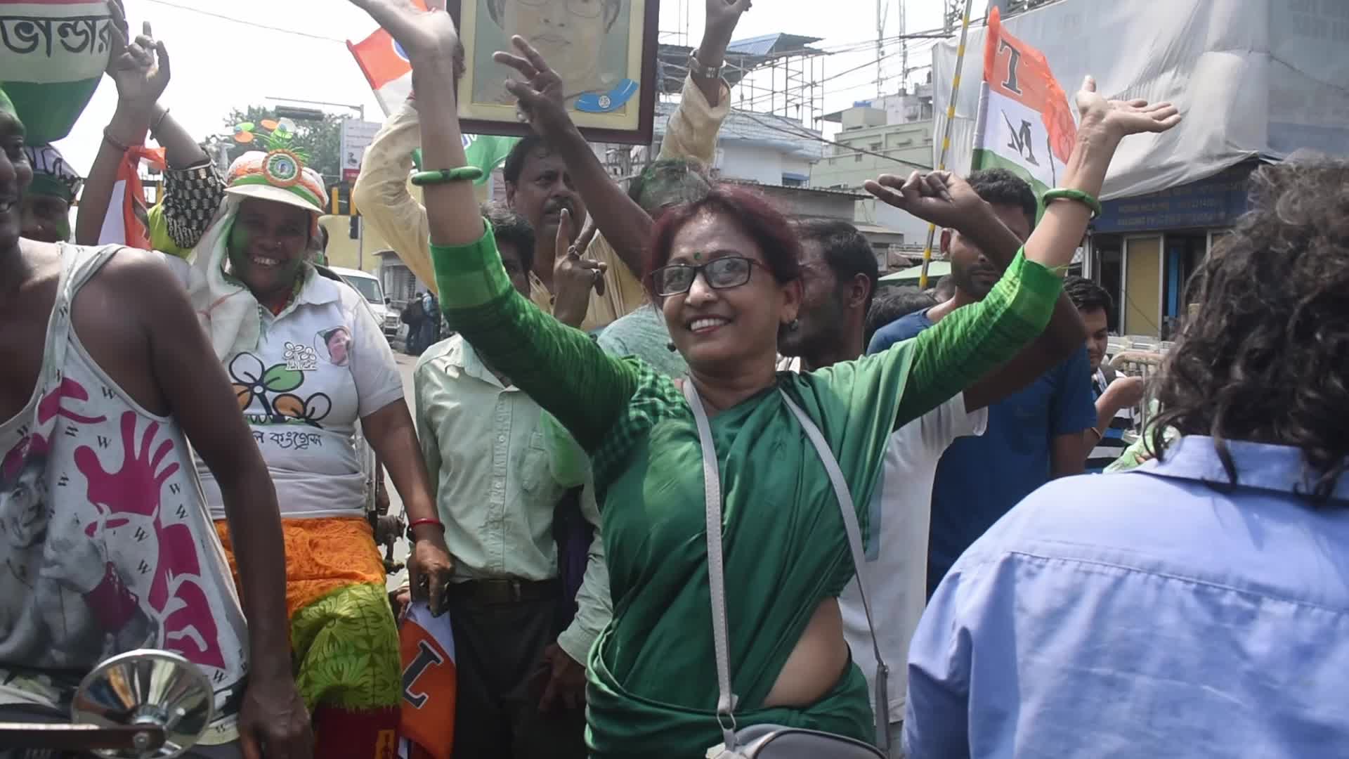 Trinamool Congress party (TMC) members cheer during Lok Sabha Election Result In Kolkata, India