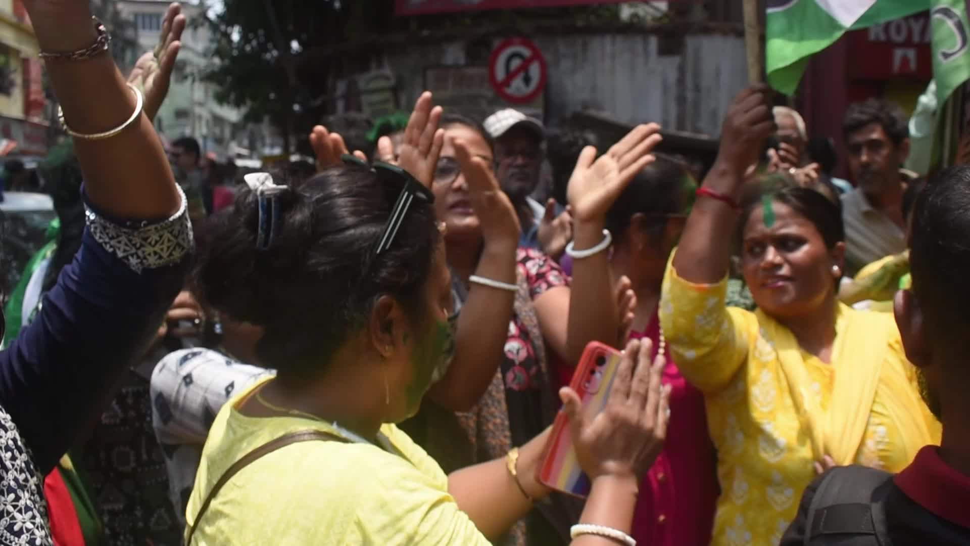 Trinamool Congress party (TMC) members cheer during Lok Sabha Election Result In Kolkata, India