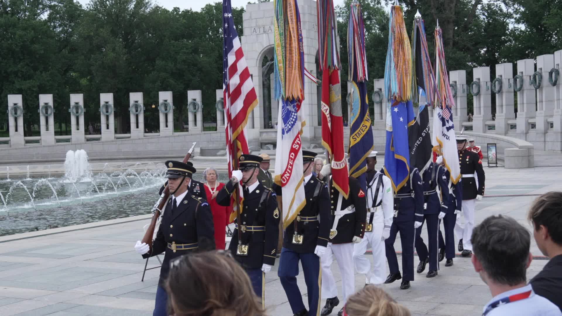 World War II and other military veterans attend a ceremony at the National World War II Memorial to commemorate the 80th anniversary of D-Day 