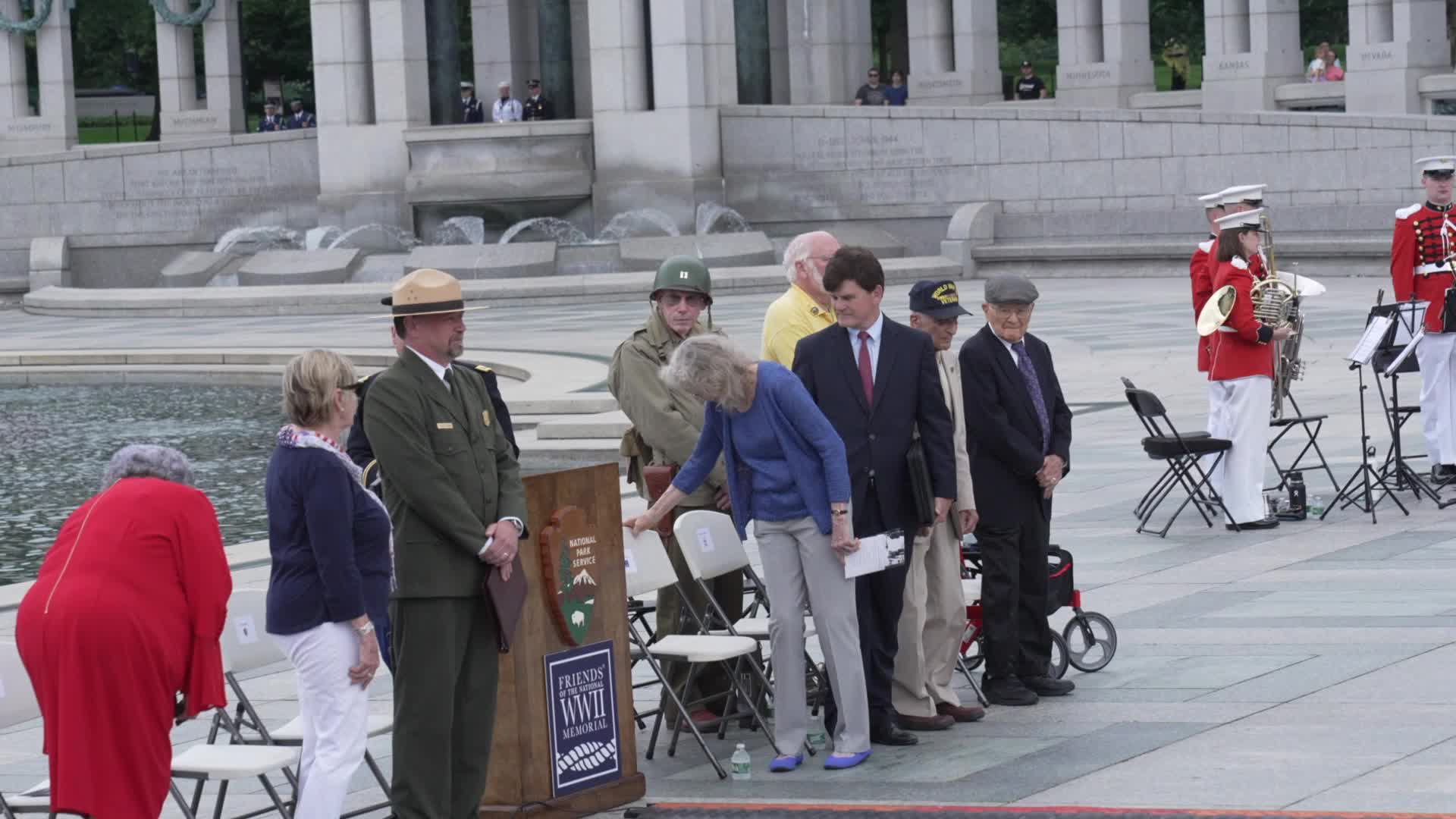 World War II and other military veterans attend a ceremony at the National World War II Memorial to commemorate the 80th anniversary of D-Day 