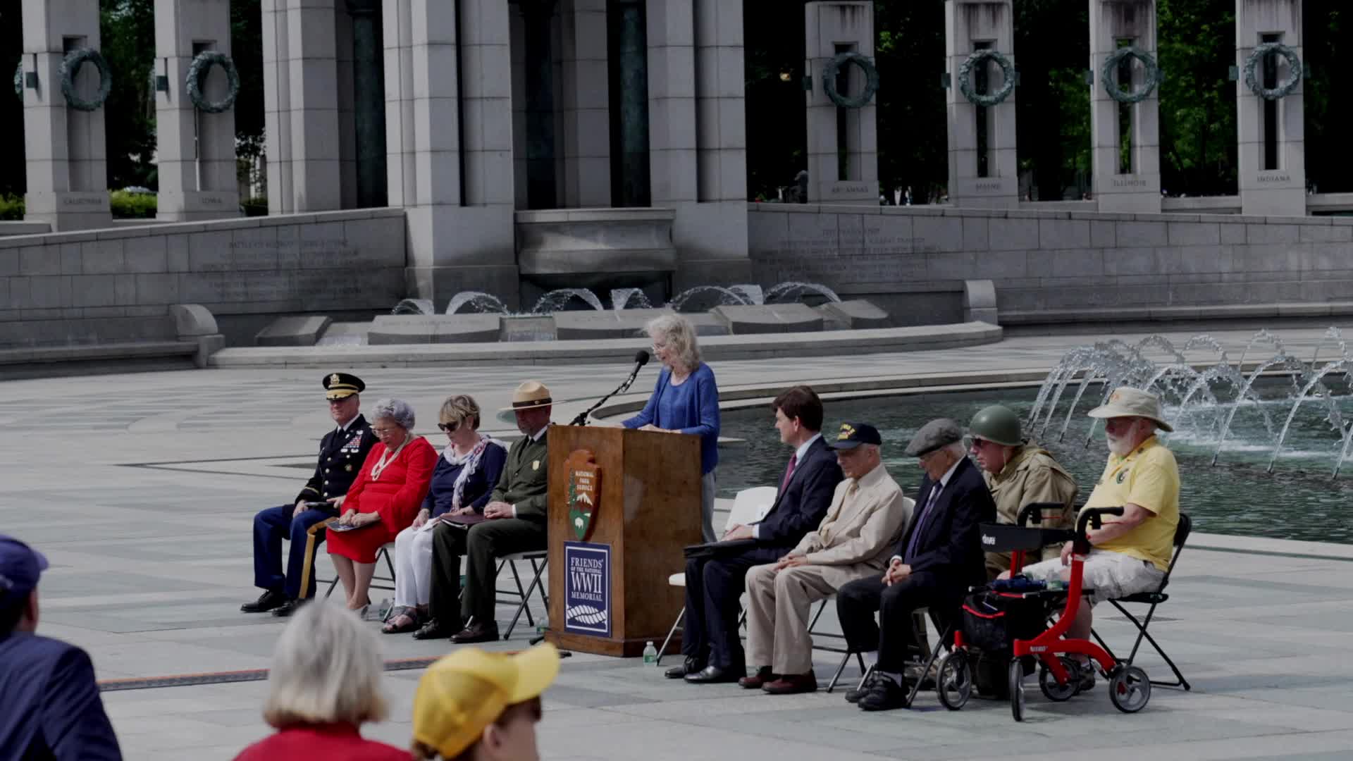 World War II and other military veterans attend a ceremony at the National World War II Memorial to commemorate the 80th anniversary of D-Day 