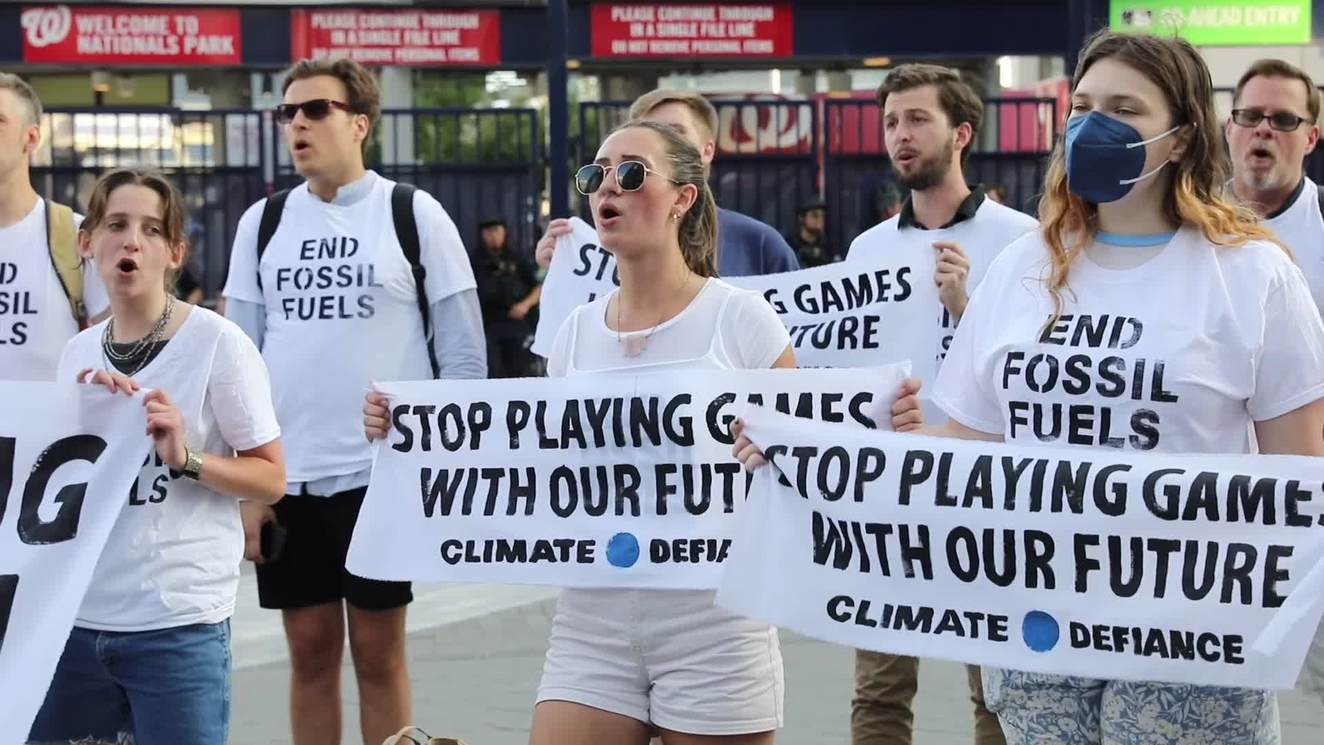 Climate activists are protesting during the annual Congressional Baseball Game in Washington DC, USA