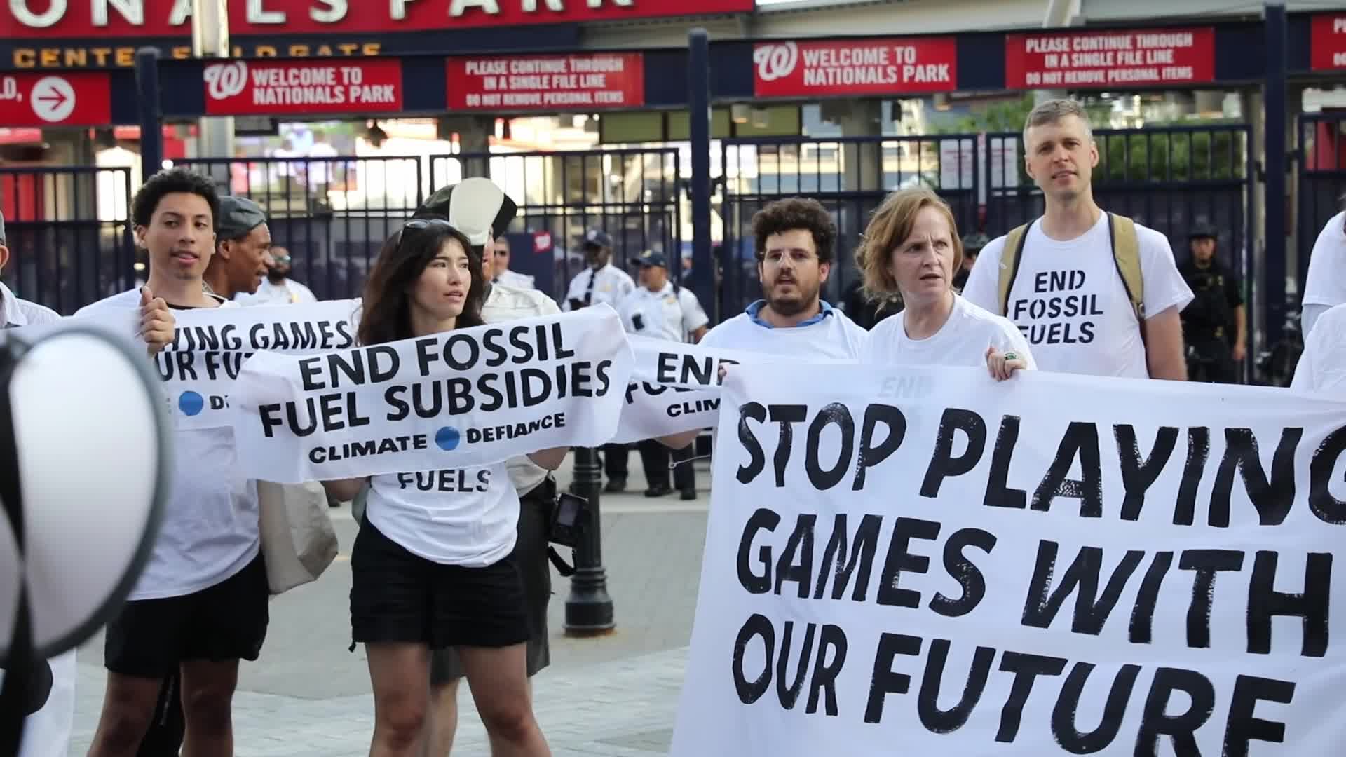 Climate activists are protesting during the annual Congressional Baseball Game in Washington DC, USA