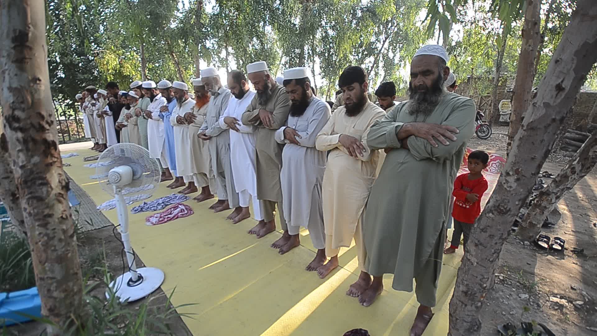 Afghan refugees perform Eid al-Adha prayer in Pakistan
