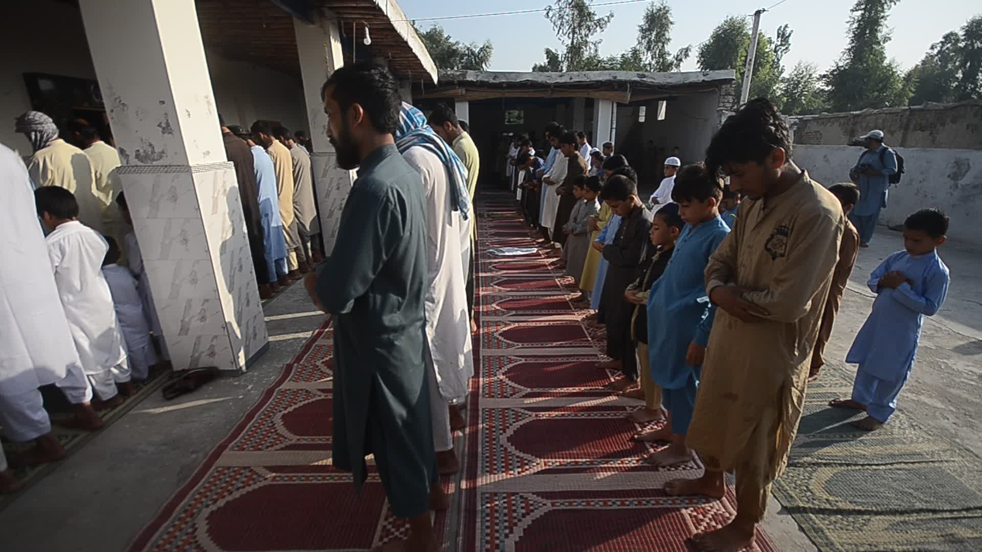 Afghan refugees perform Eid al-Adha prayer in Pakistan
