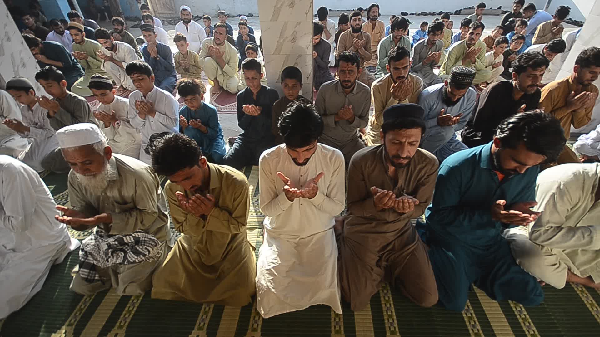 Afghan refugees perform Eid al-Adha prayer in Pakistan
