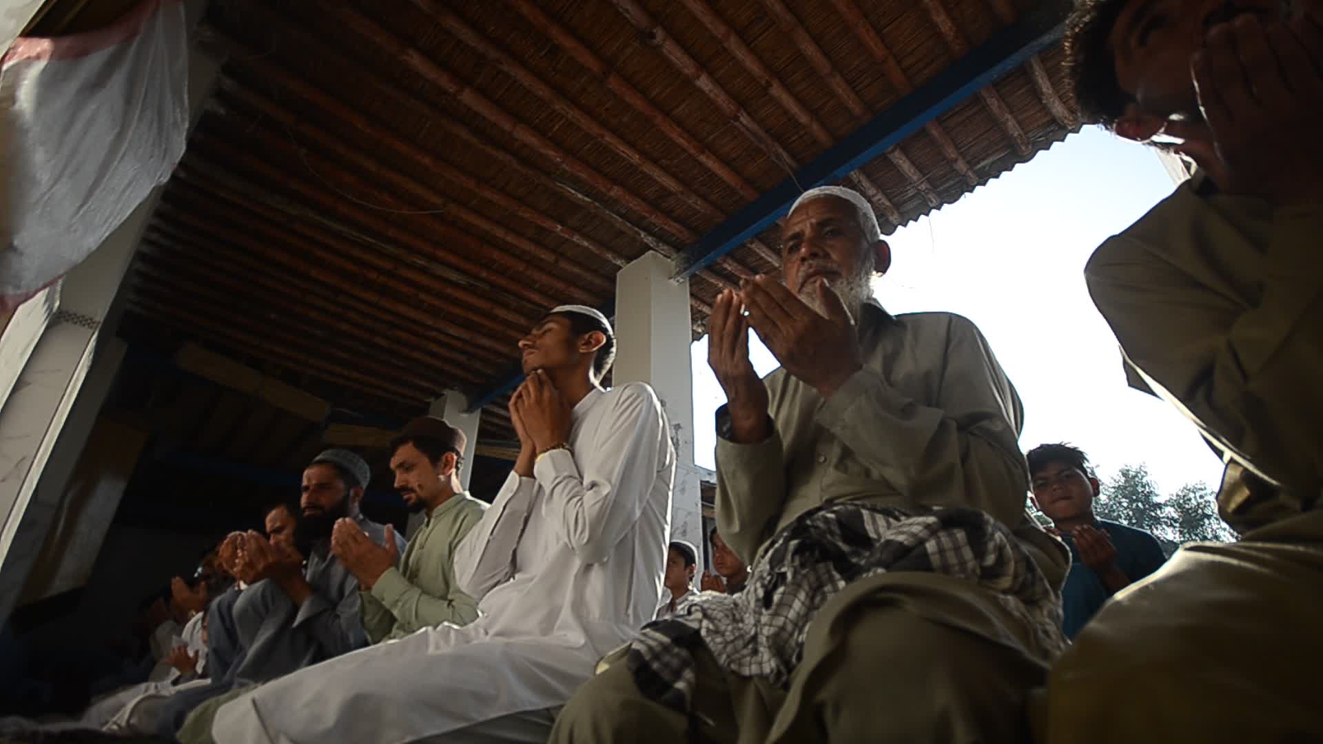 Afghan refugees perform Eid al-Adha prayer in Pakistan
