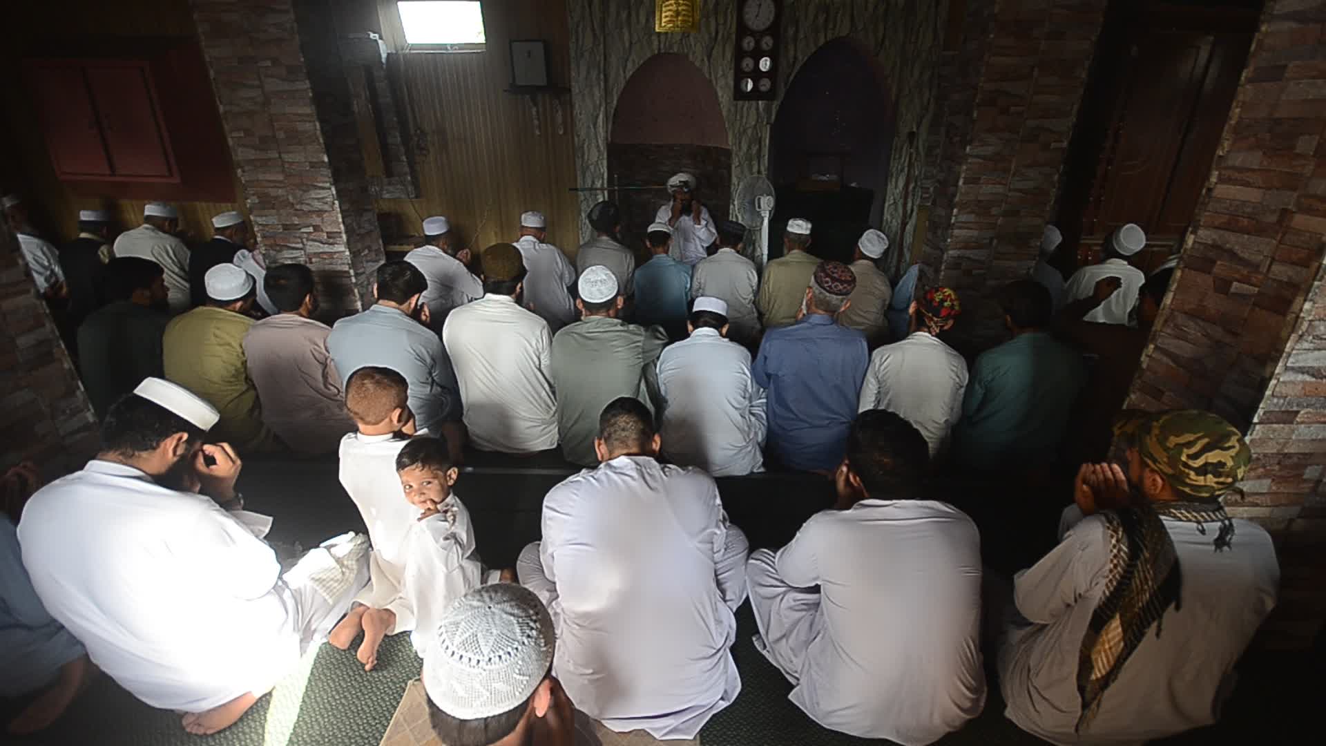 Afghan refugees perform Eid al-Adha prayer in Pakistan
