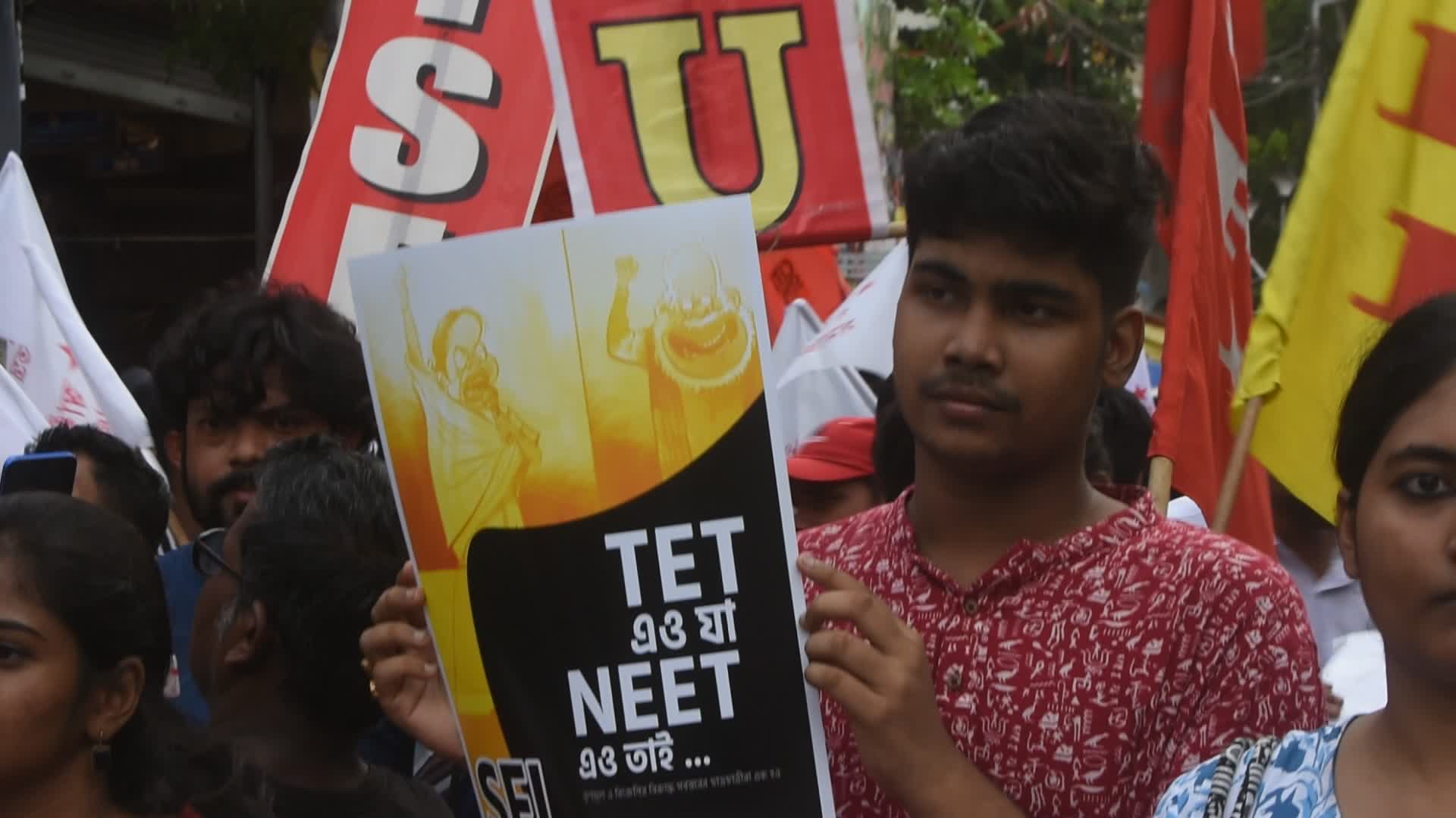 Students protest against medical entrance exam scam in India.