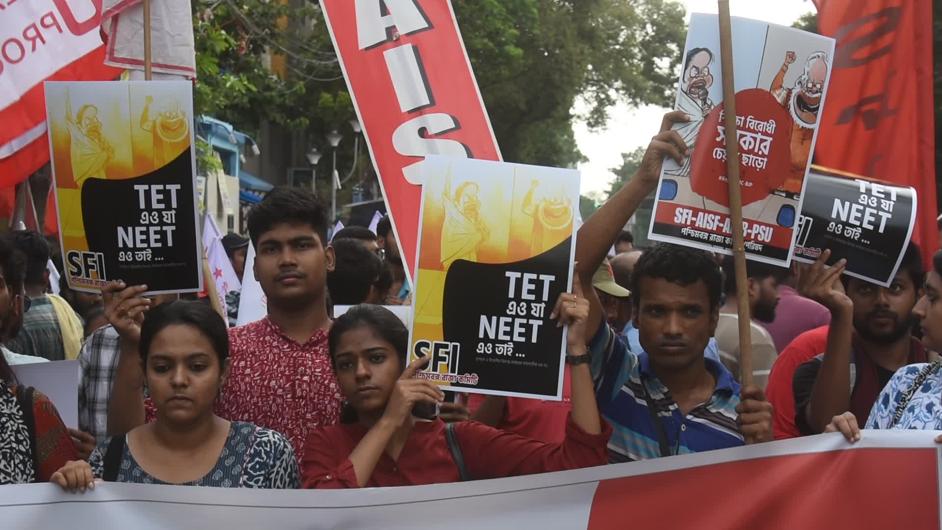 Students protest against medical entrance exam scam in India.