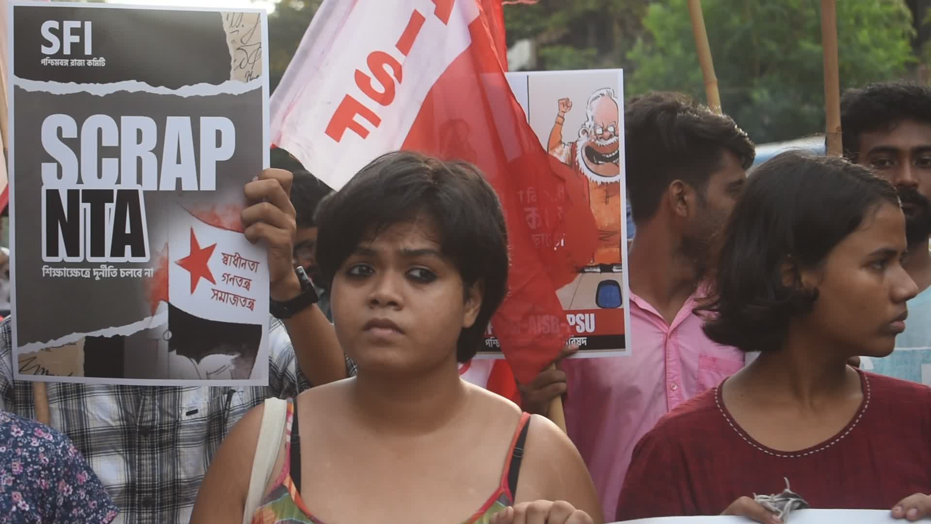 Students protest against medical entrance exam scam in India.