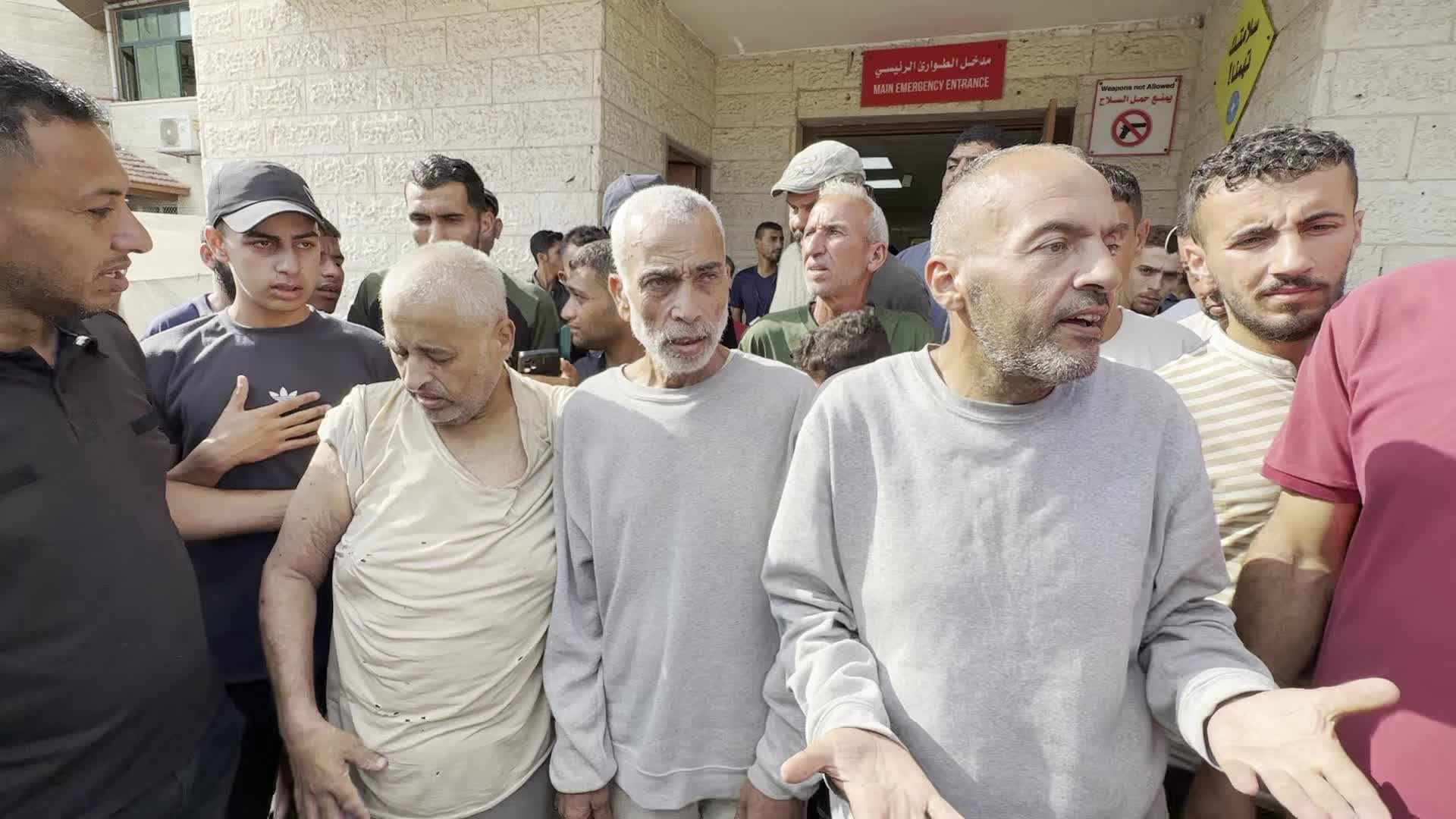 Released Palestinian Man Welcomed by Family at Gaza Hospital Amid Ongoing Conflict