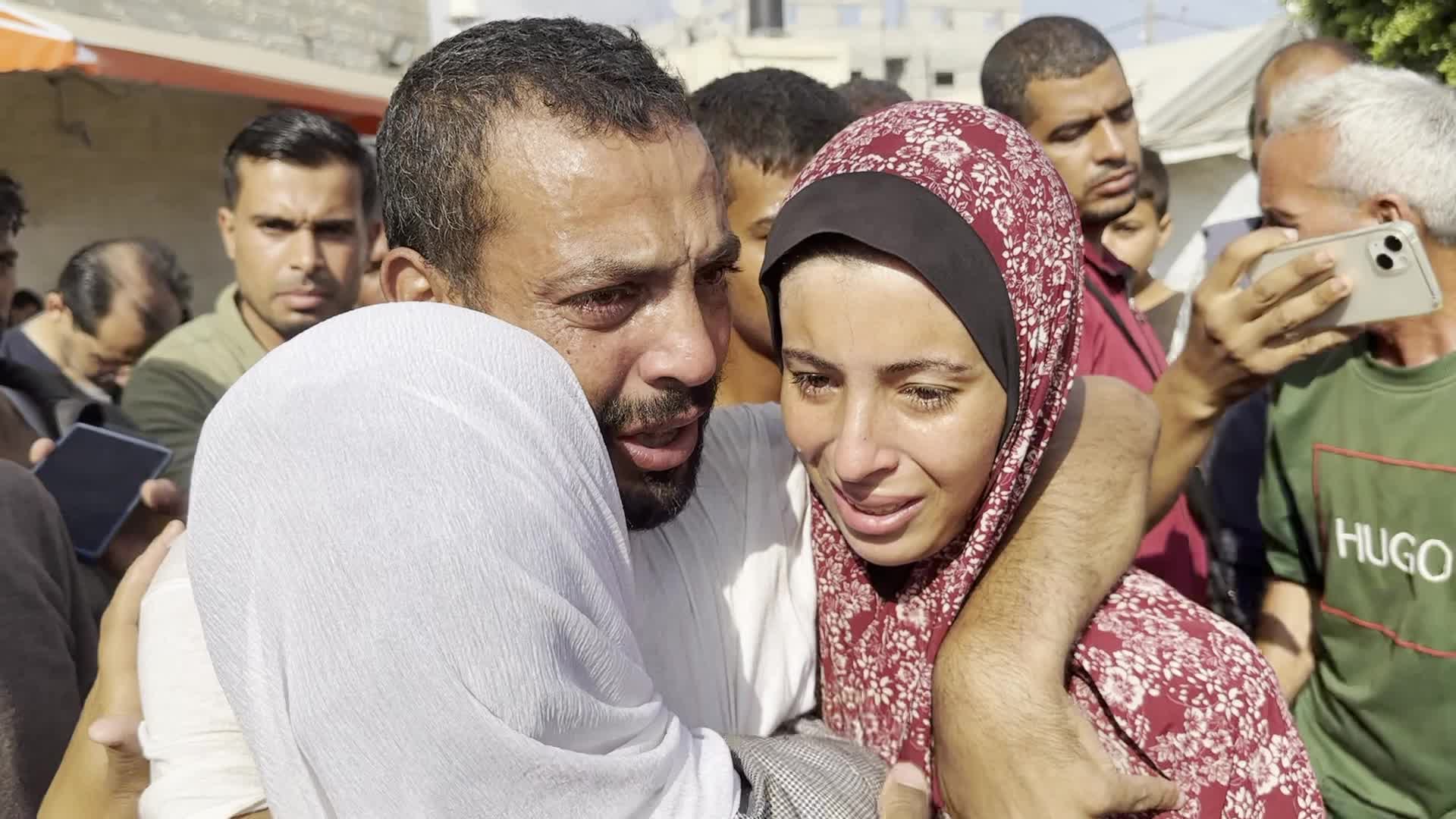 Released Palestinian Man Welcomed by Family at Gaza Hospital Amid Ongoing Conflict