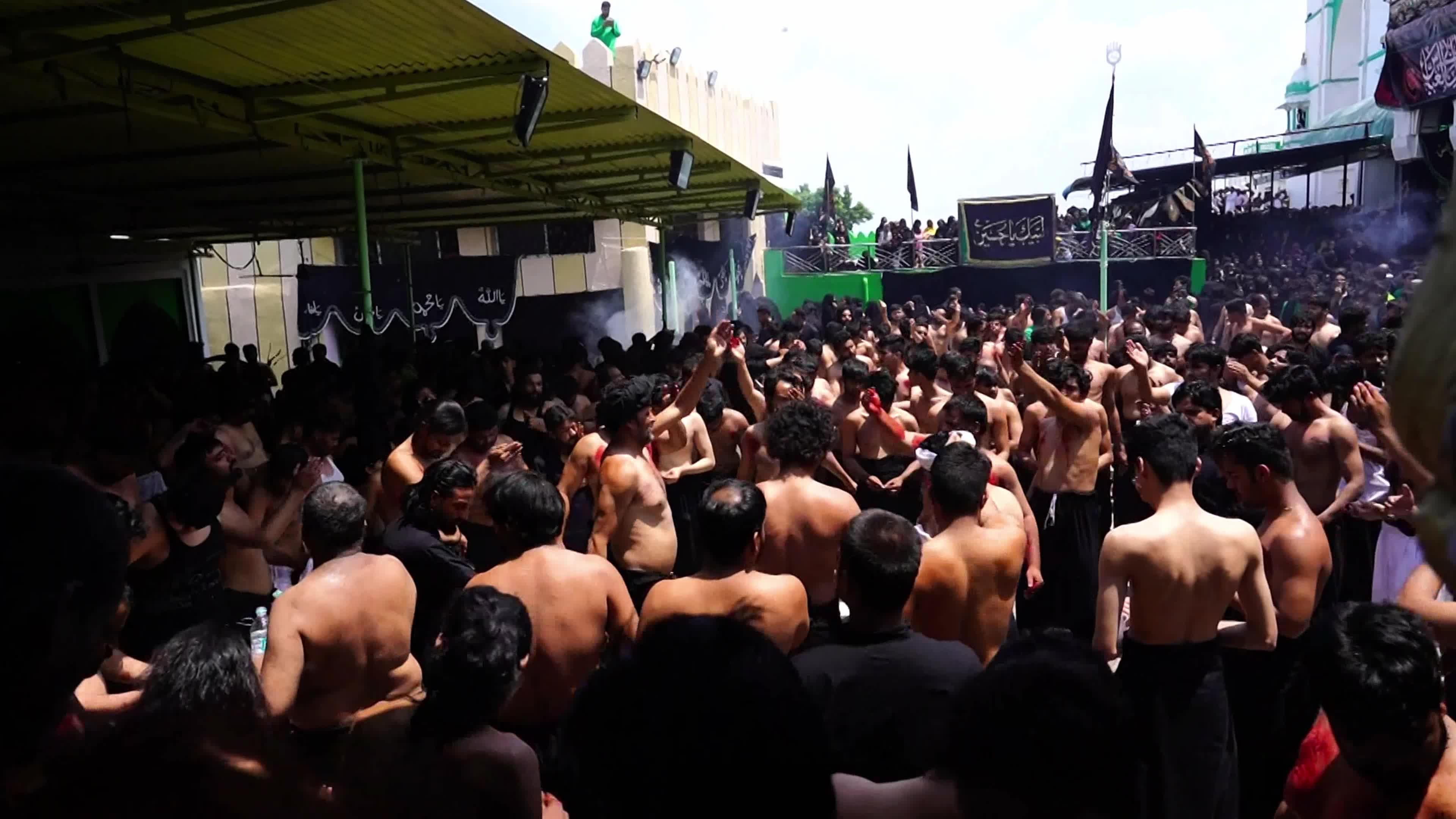Shiite Muslim mourners flagellate themselves on the tenth day of Ashura during the Islamic month of Muharram