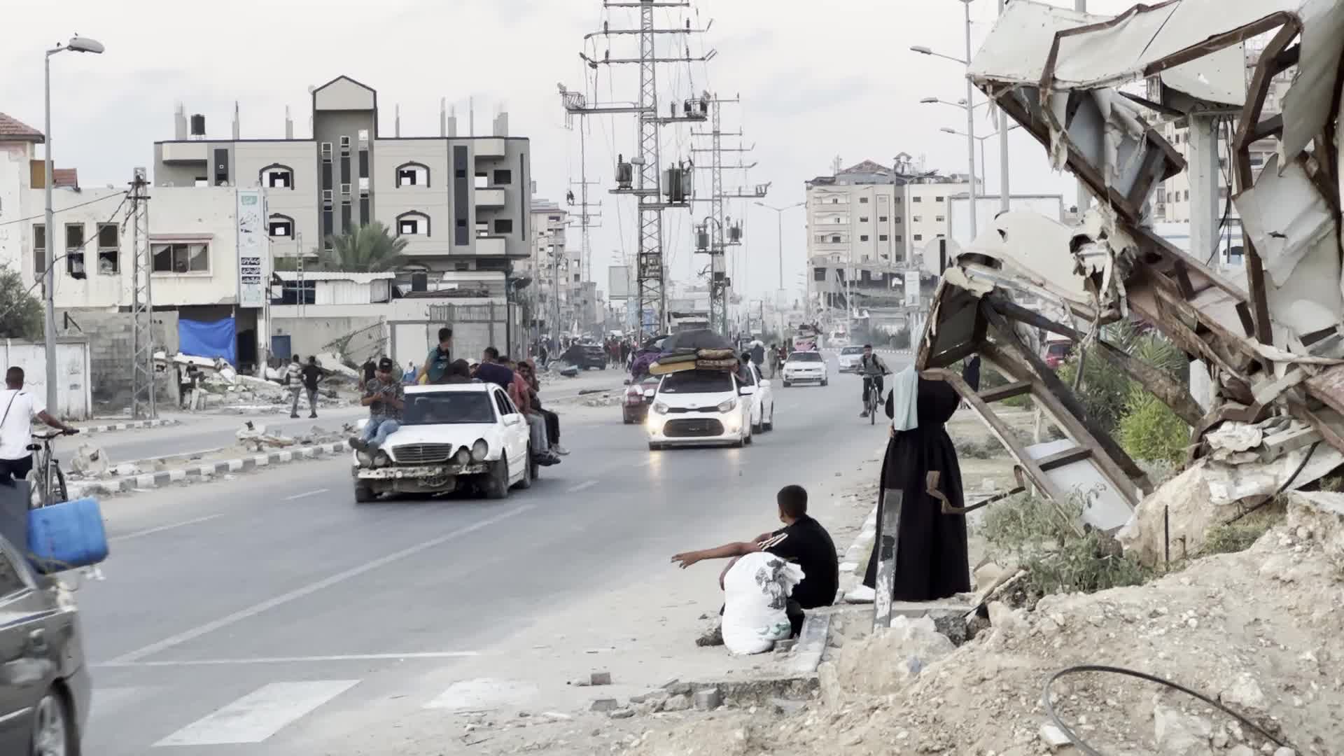 Displaced Palestinians Leave al-Bureij Refugee Camp Following Israeli Evacuation Order Amid Ongoing Israel-Hamas Conflict