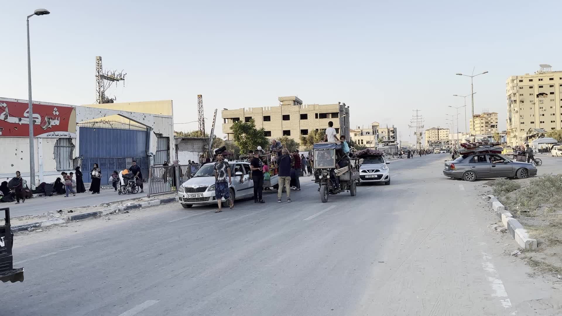 Displaced Palestinians Leave al-Bureij Refugee Camp Following Israeli Evacuation Order Amid Ongoing Israel-Hamas Conflict