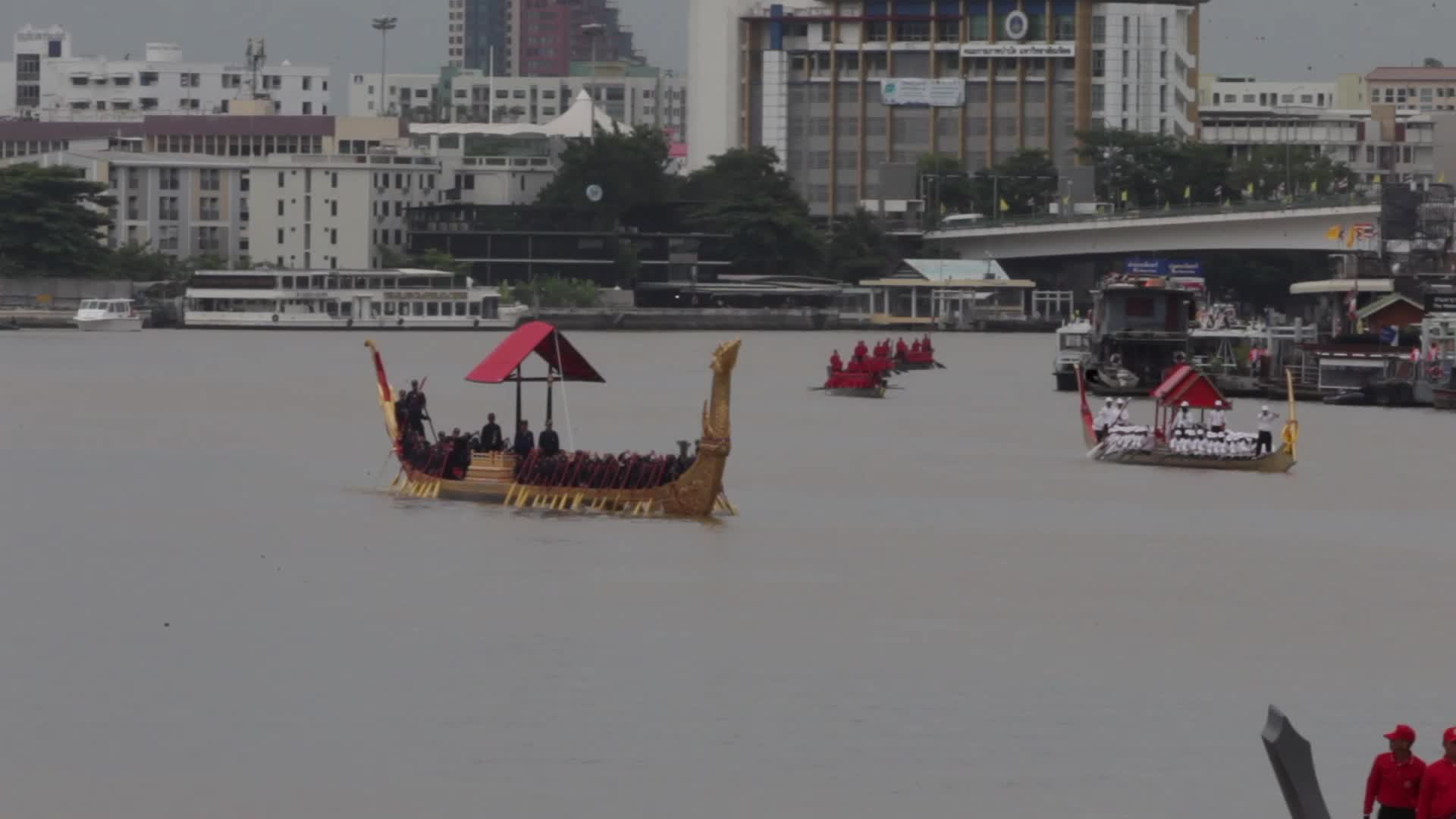 Thai Oarsmen Row Royal Barges During Practice Procession on Chao Phraya River