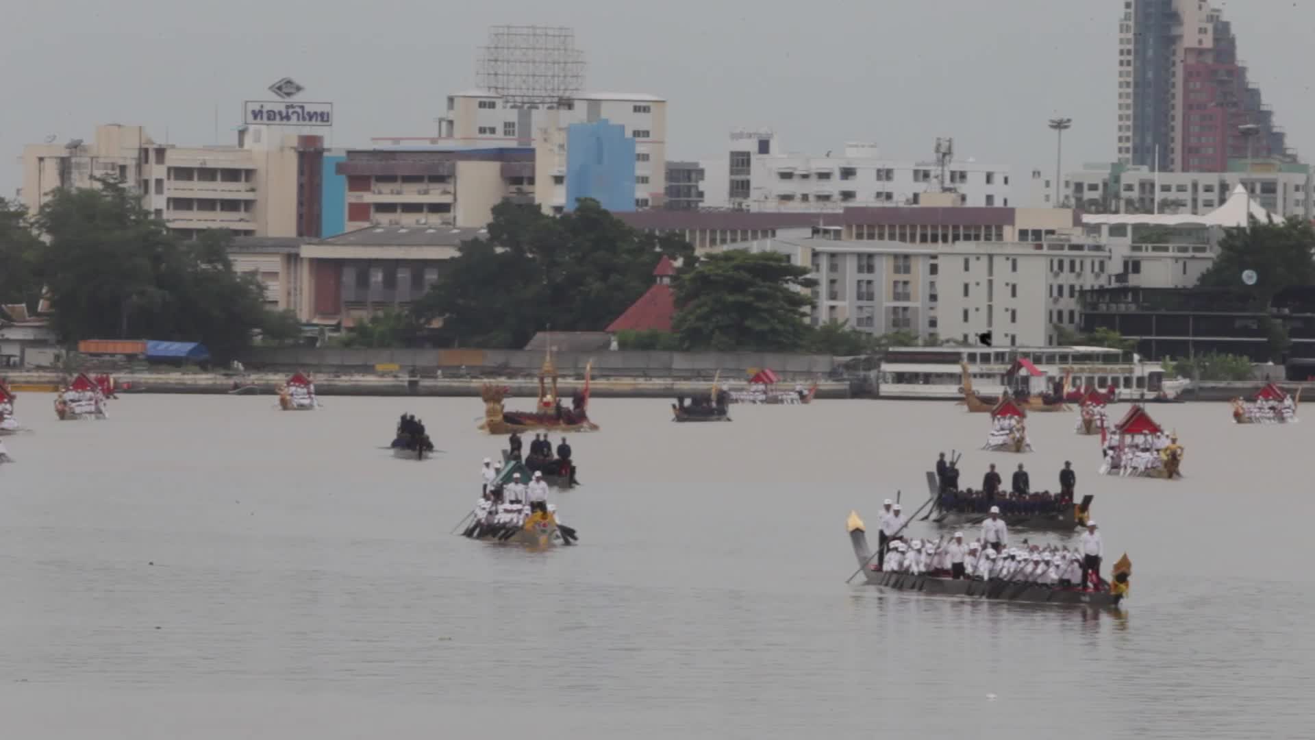 Thai Oarsmen Row Royal Barges During Practice Procession on Chao Phraya River