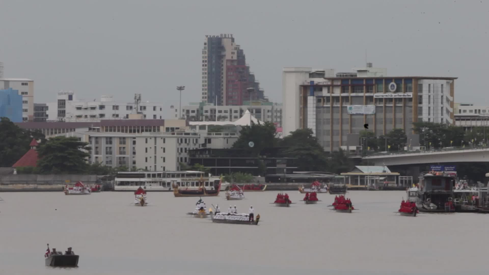 Thai Oarsmen Row Royal Barges During Practice Procession on Chao Phraya River