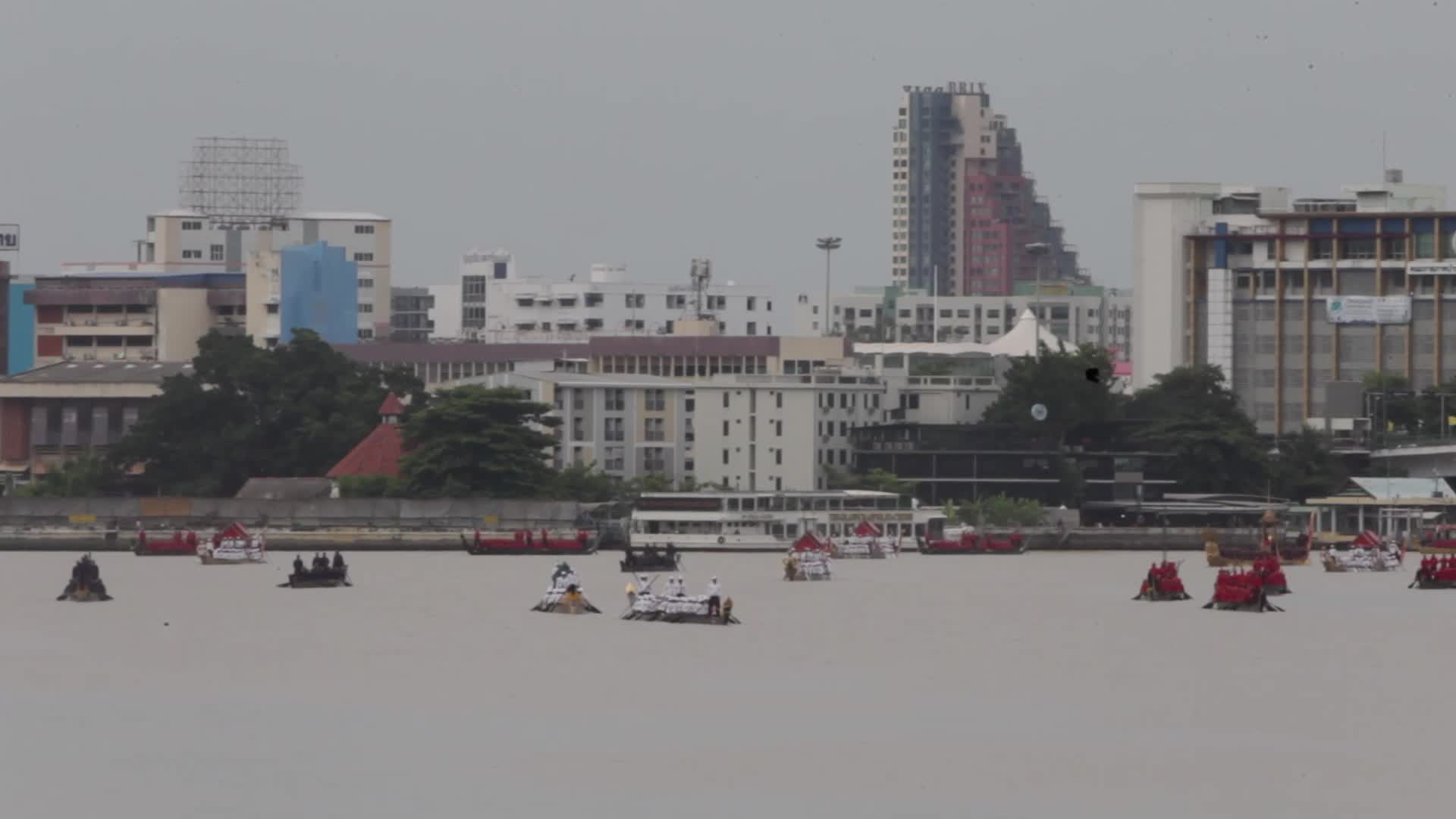 Thai Oarsmen Row Royal Barges During Practice Procession on Chao Phraya River