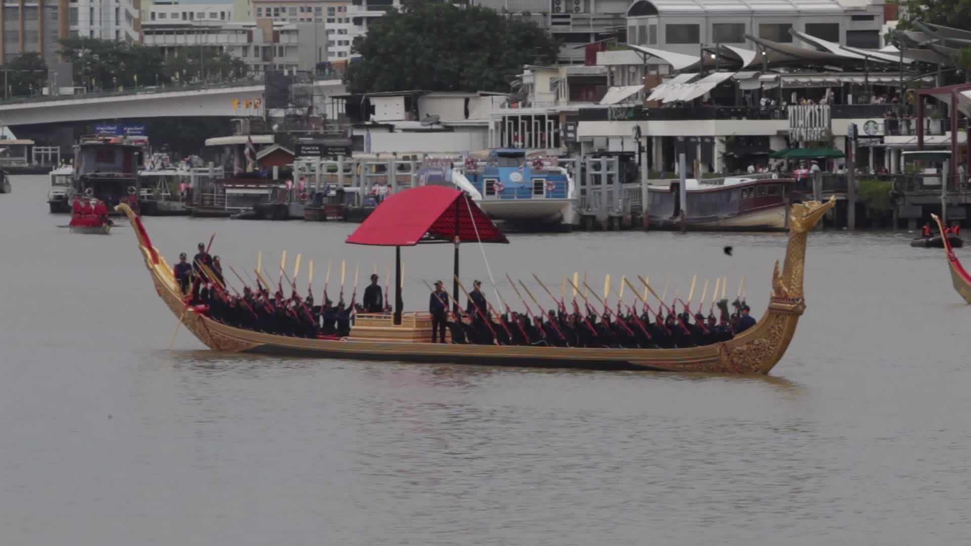 Thai Oarsmen Row Royal Barges During Practice Procession on Chao Phraya River